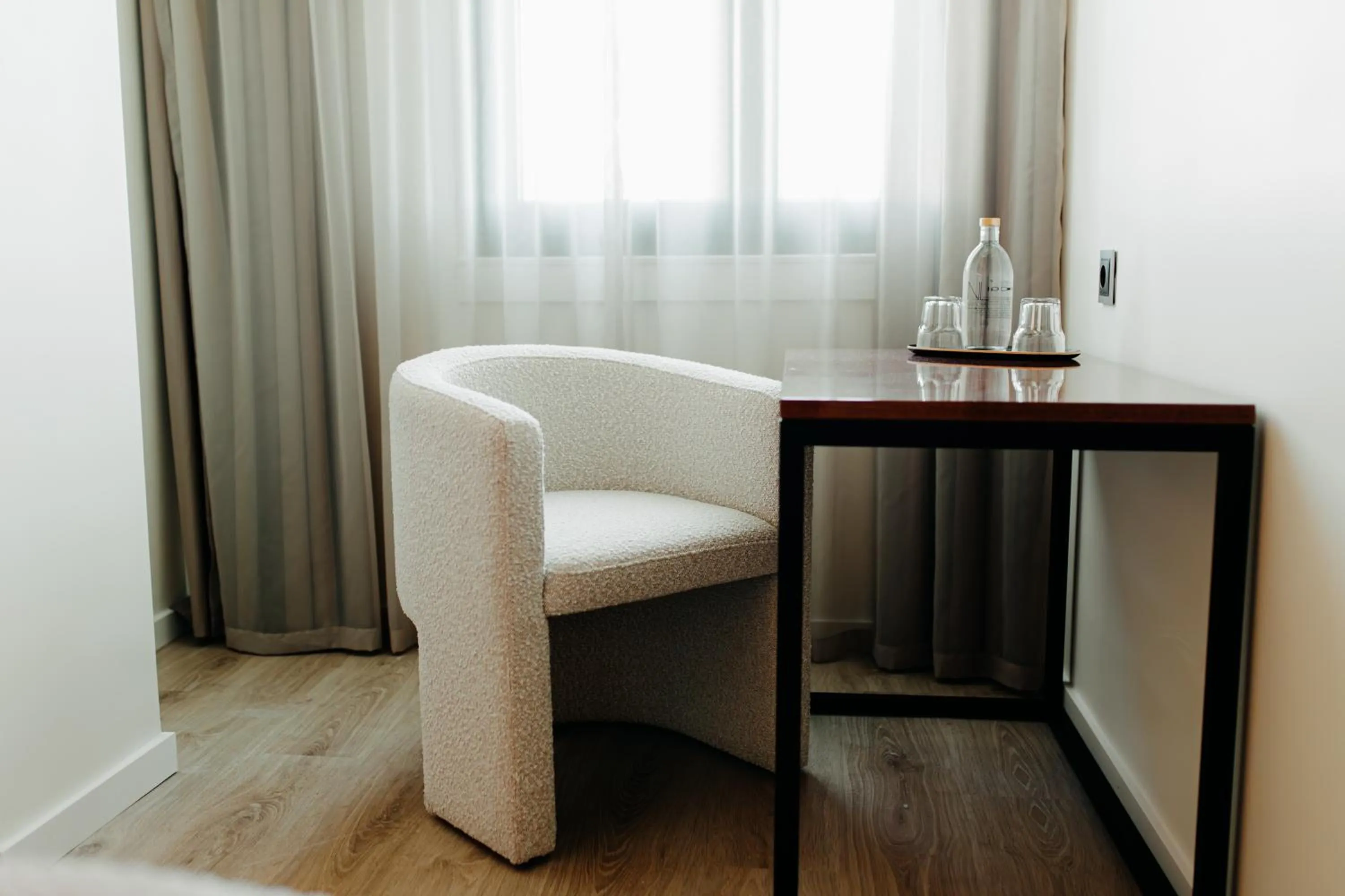 Seating area in Next Level Premium Hotels