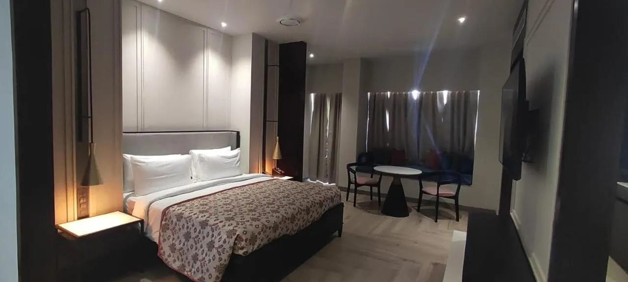 Bed in Pramod Lands End Resort, a member of Radisson Individuals