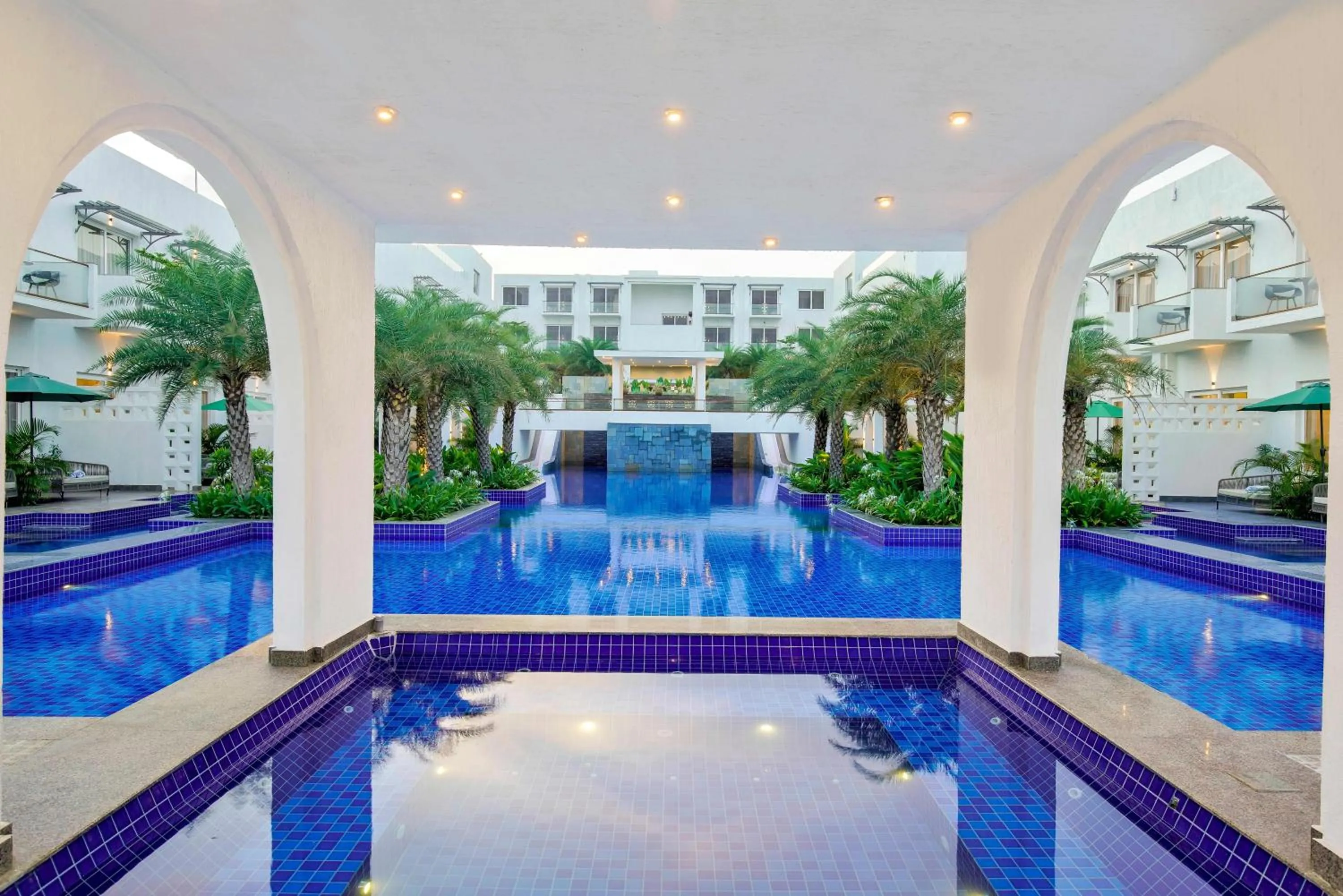 Swimming pool in Pramod Lands End Resort, a member of Radisson Individuals