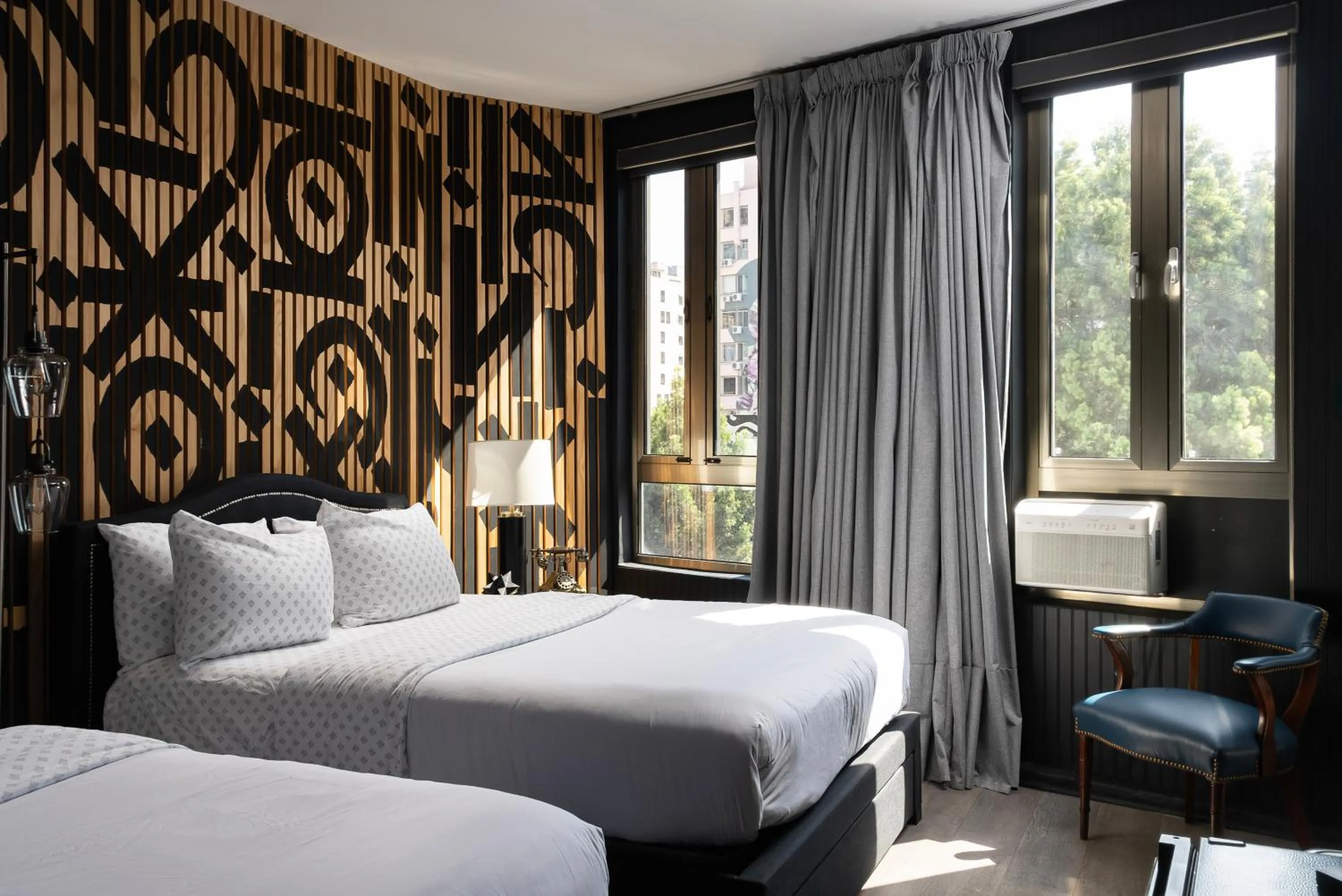 Bed in Audemar Boutique Hotel and Apartment Homes