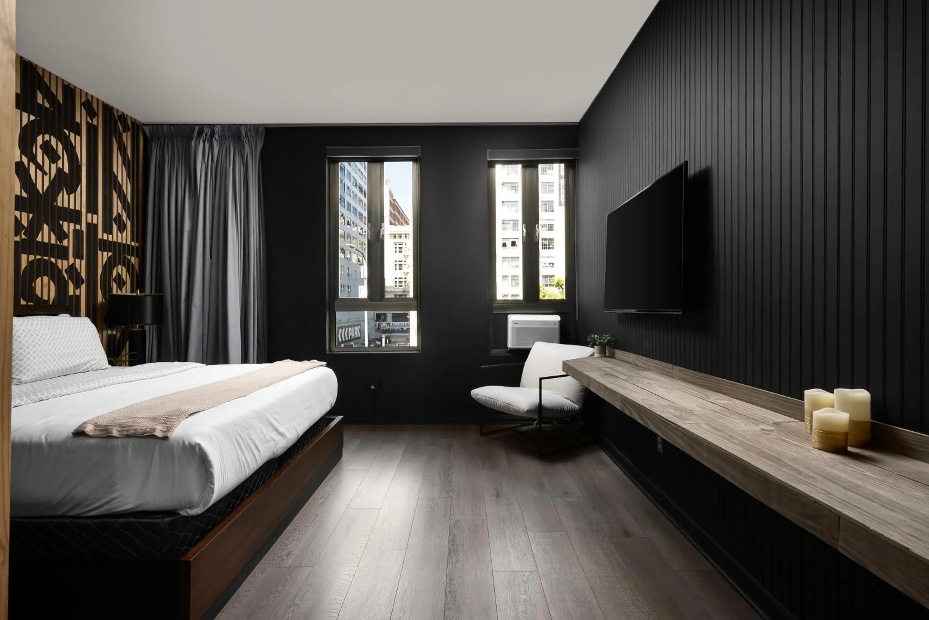 Bed in Audemar Boutique Hotel and Apartment Homes