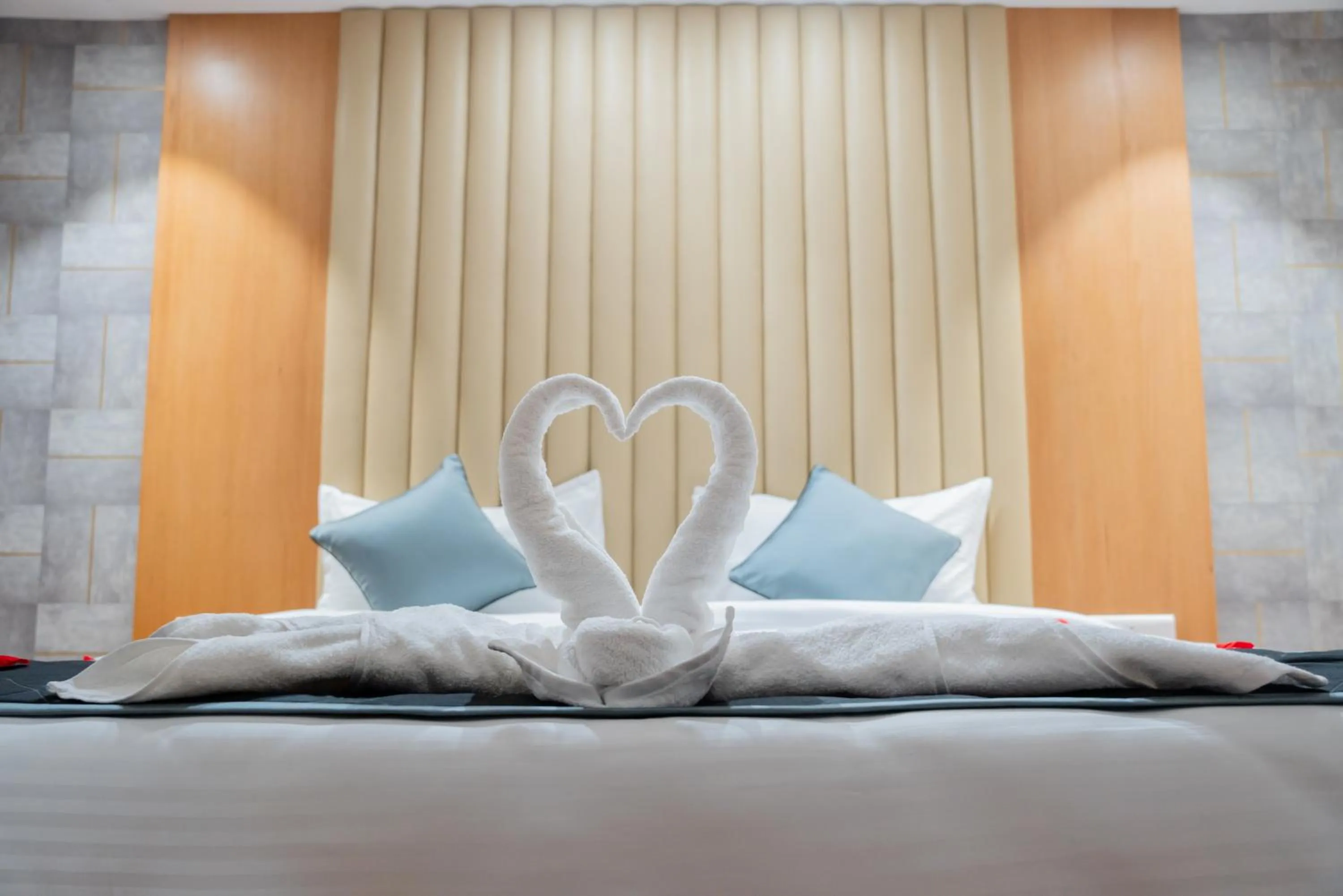 Bed in Hotel Tulips Grand