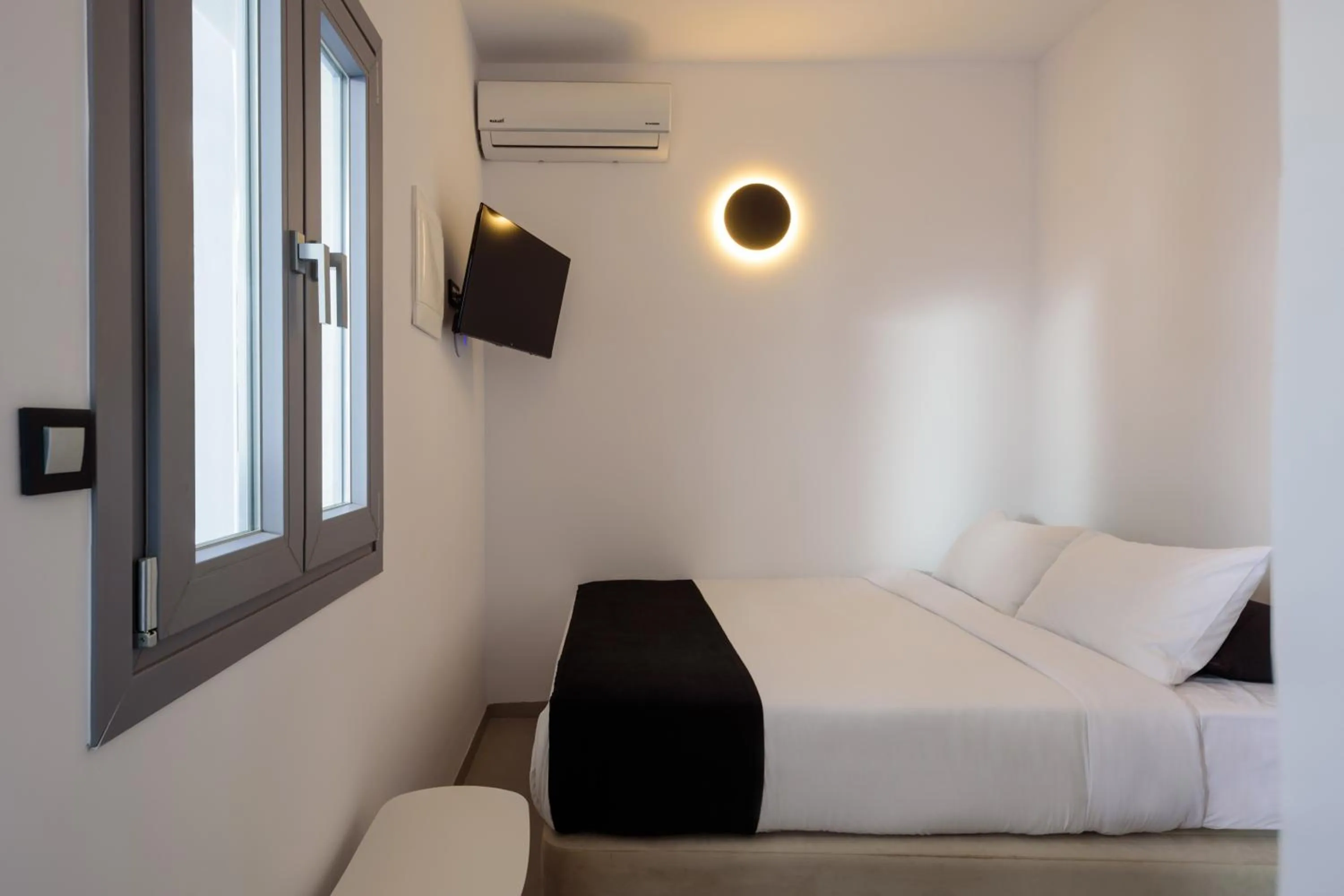 Bed in Tataki Family Hotel