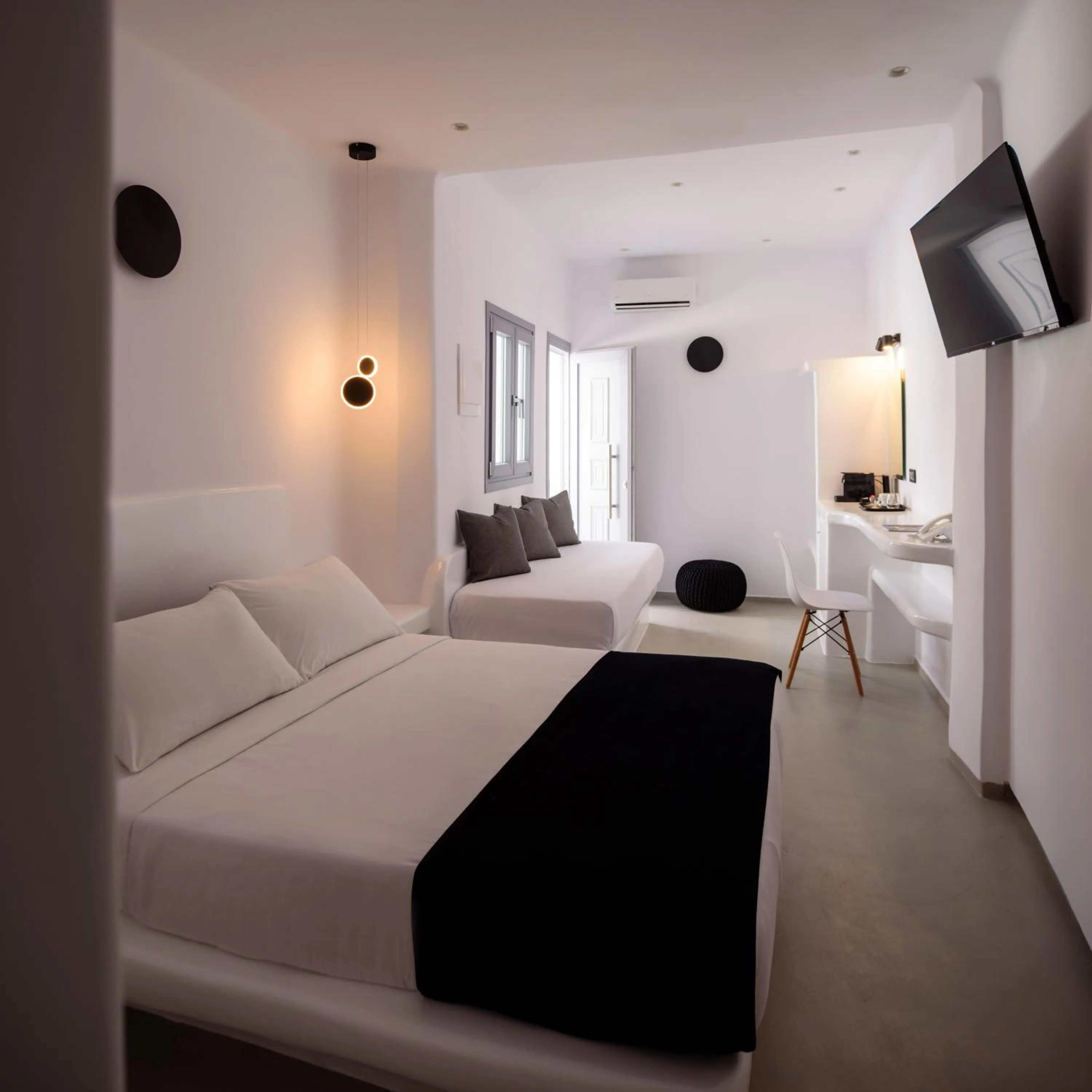 Bed in Tataki Family Hotel