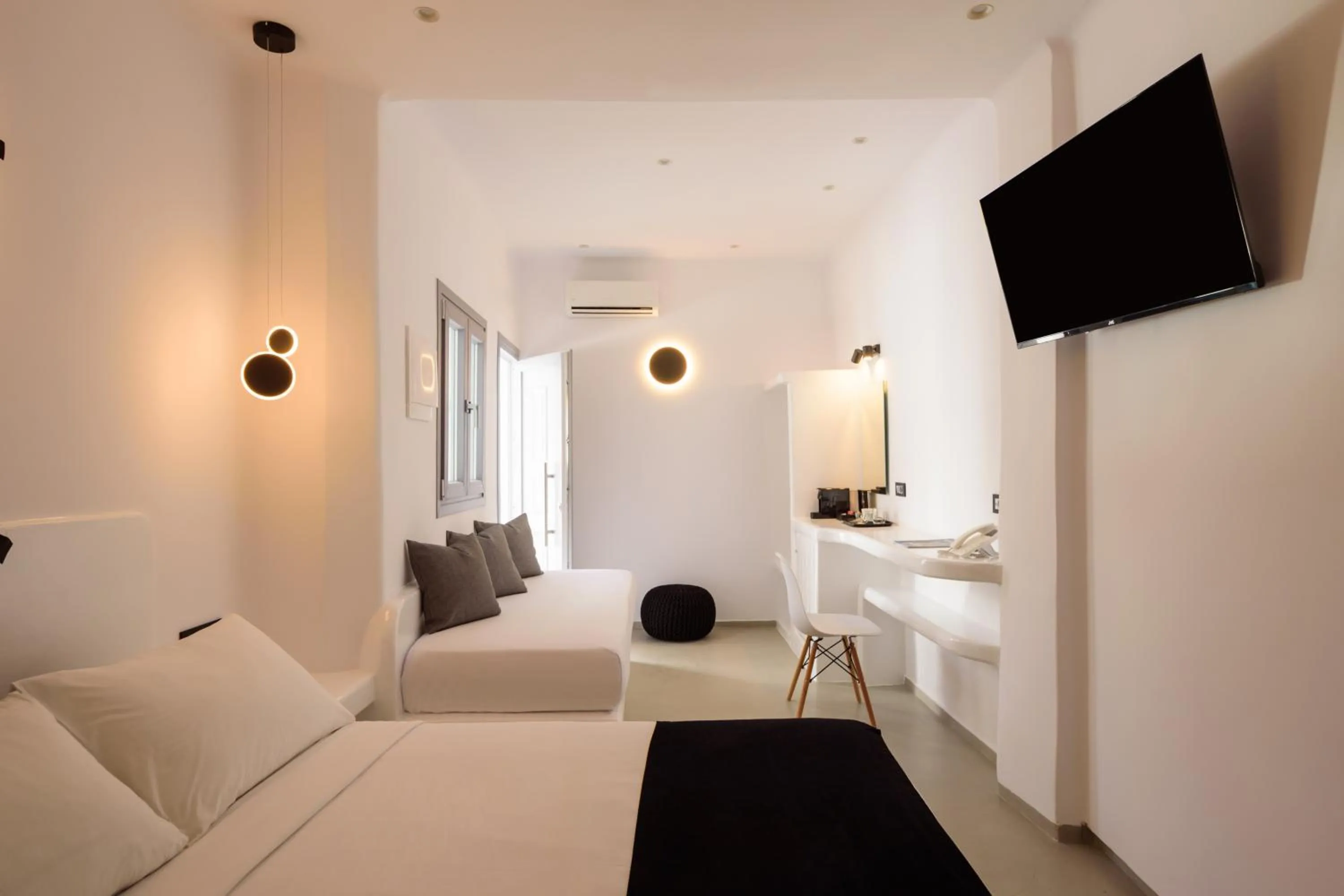 Bed in Tataki Family Hotel