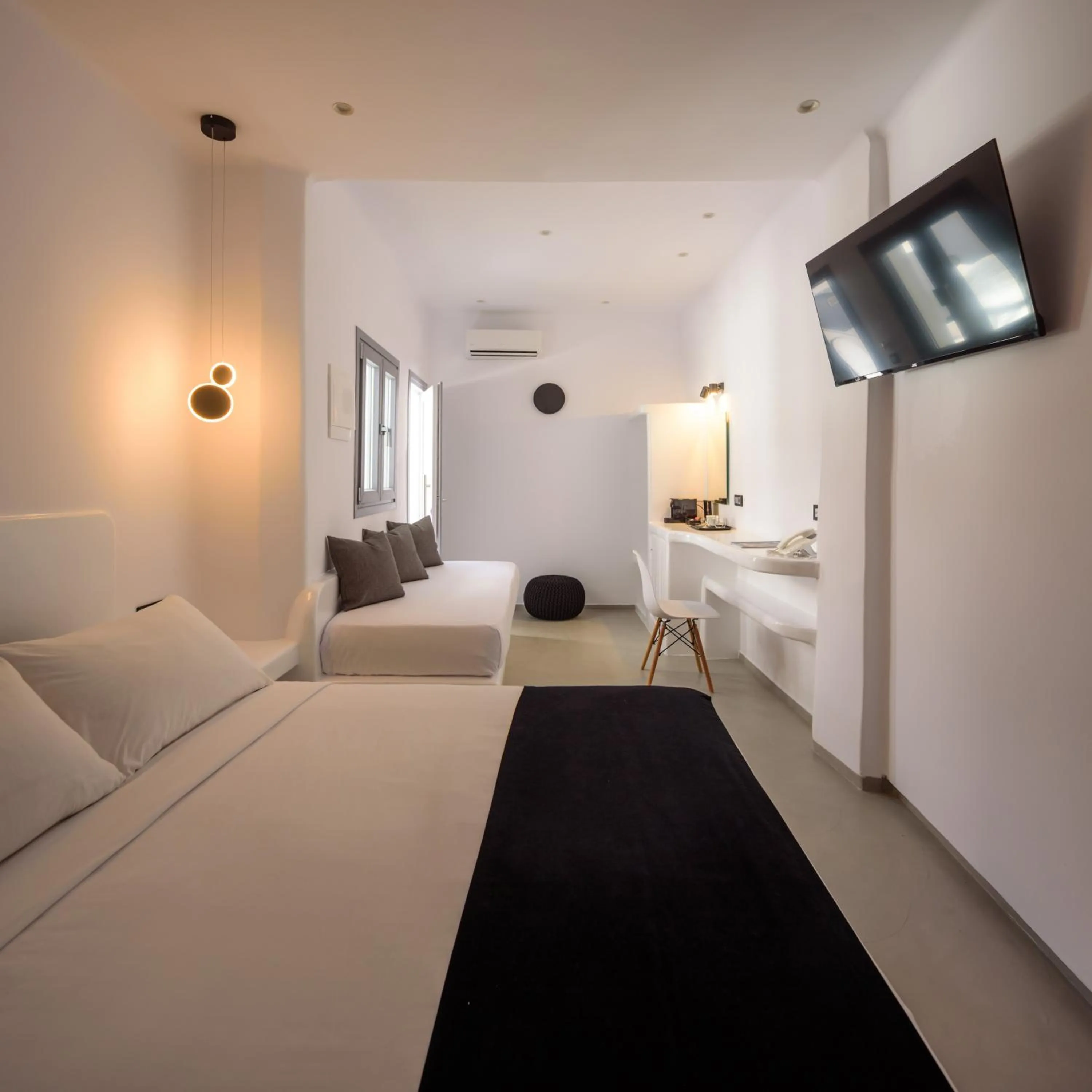 Bed in Tataki Family Hotel