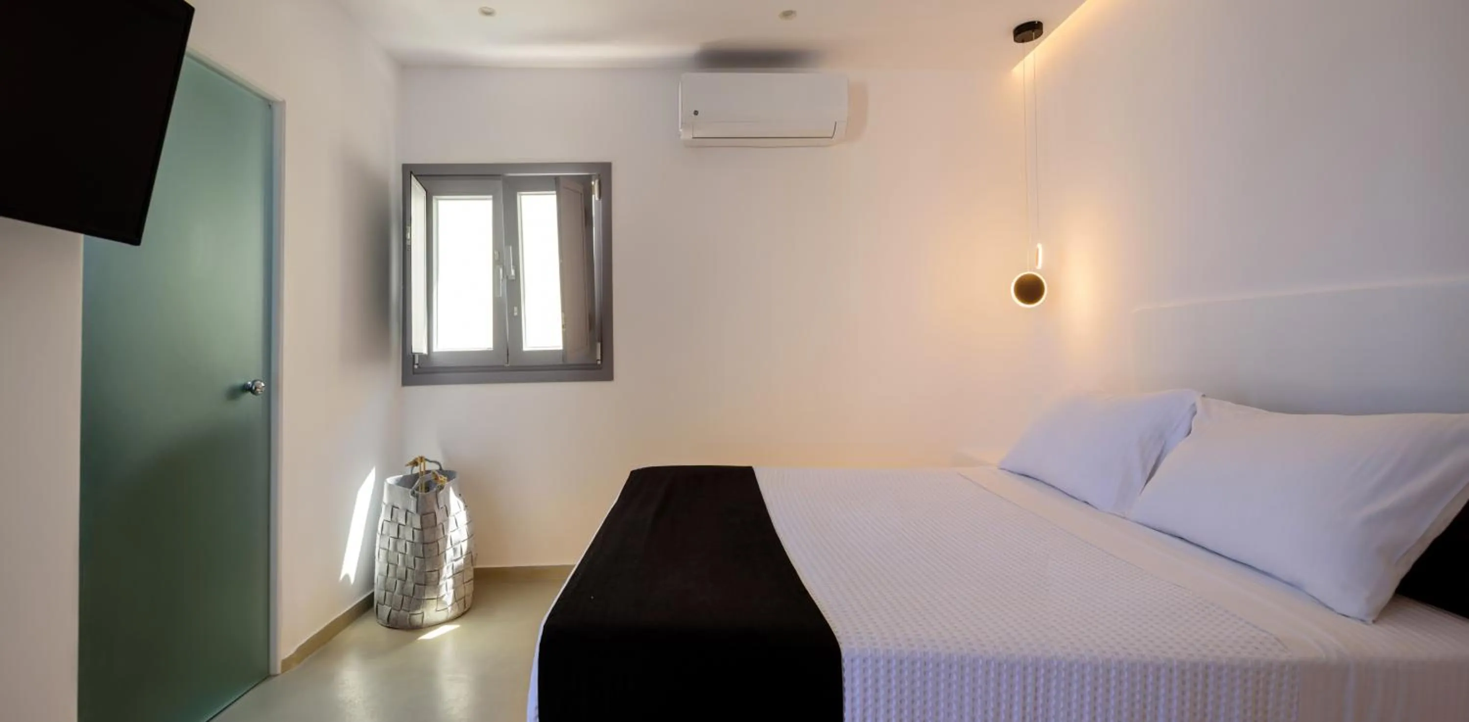 Bed in Tataki Family Hotel