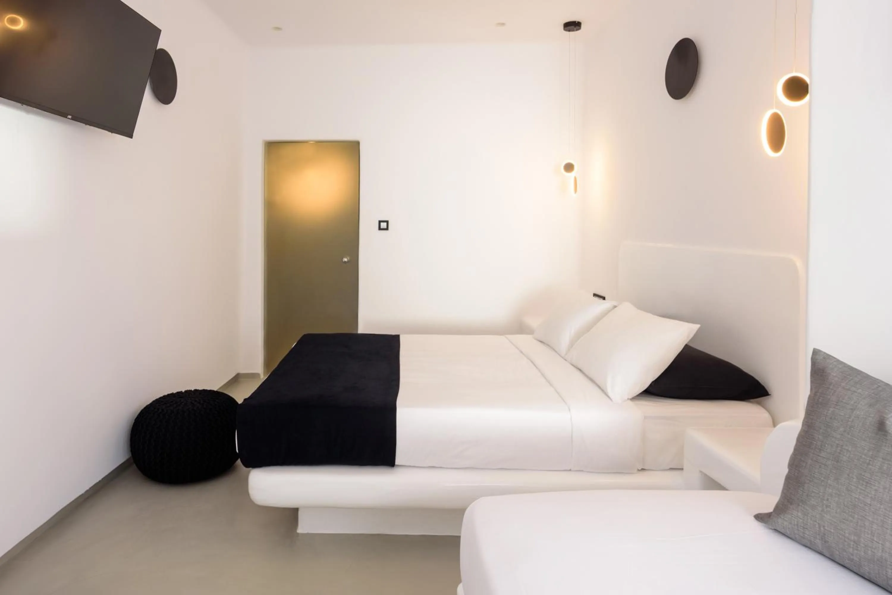 Bed in Tataki Family Hotel