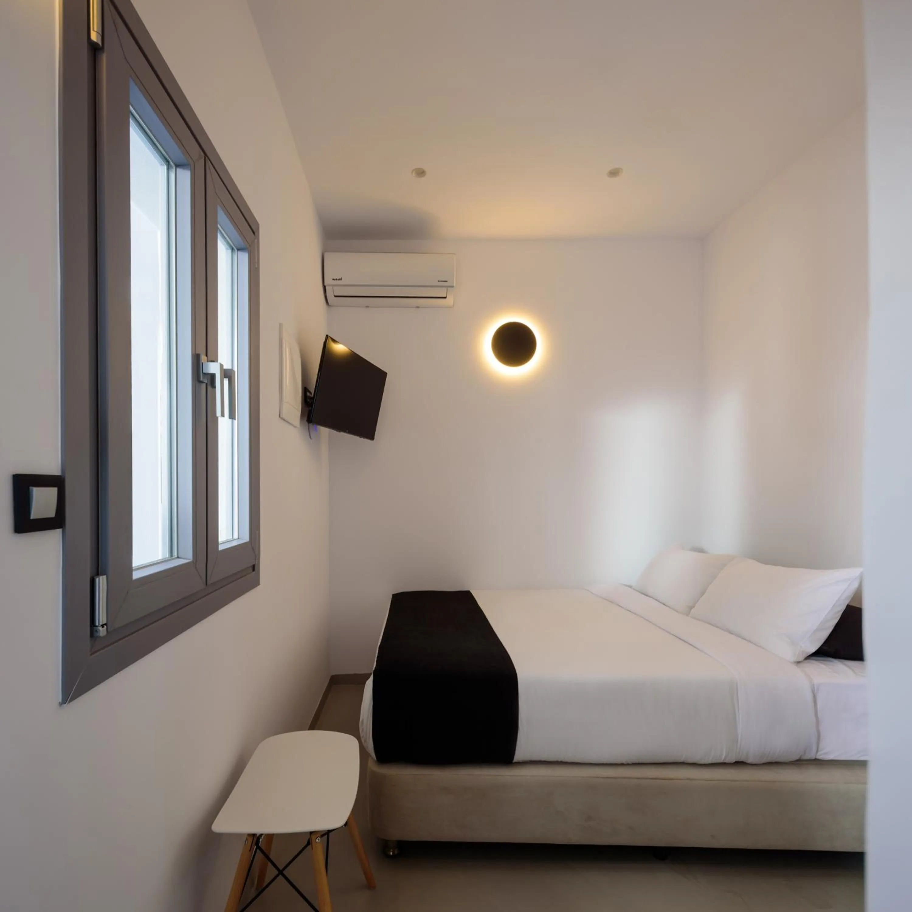 Bed in Tataki Family Hotel