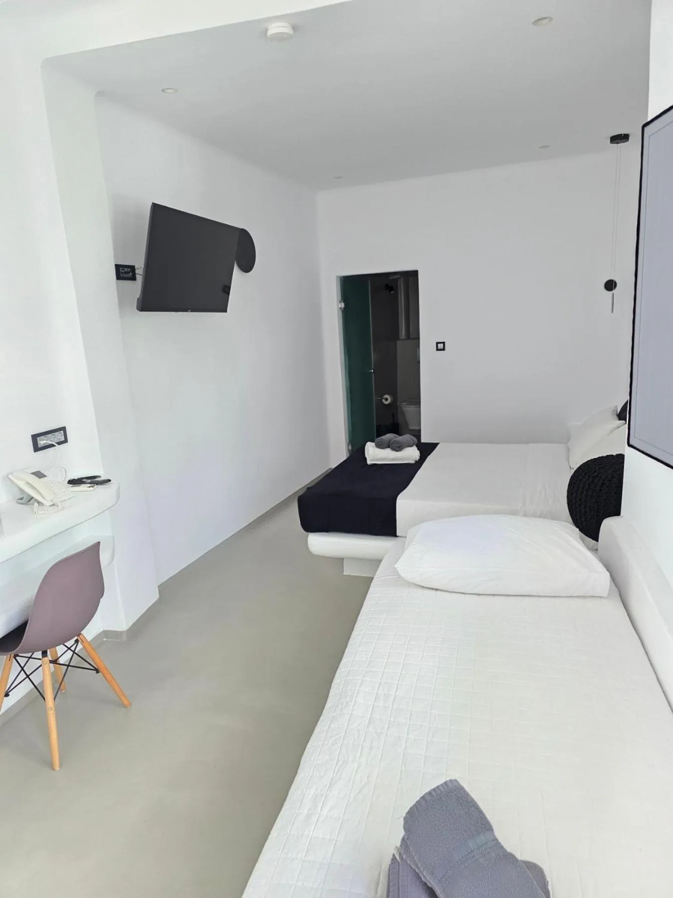 Bed in Tataki Family Hotel