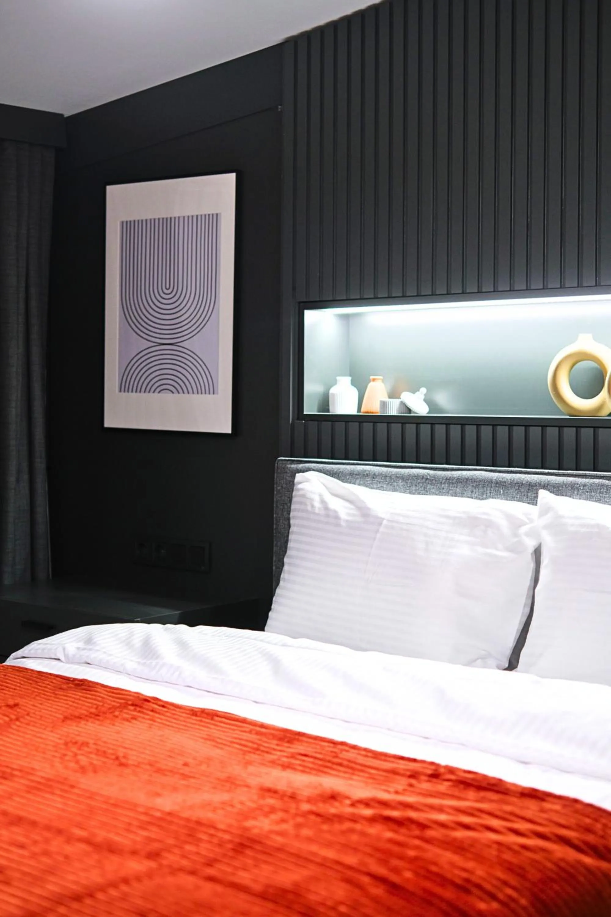 Bed in TAKS-INN Hotel