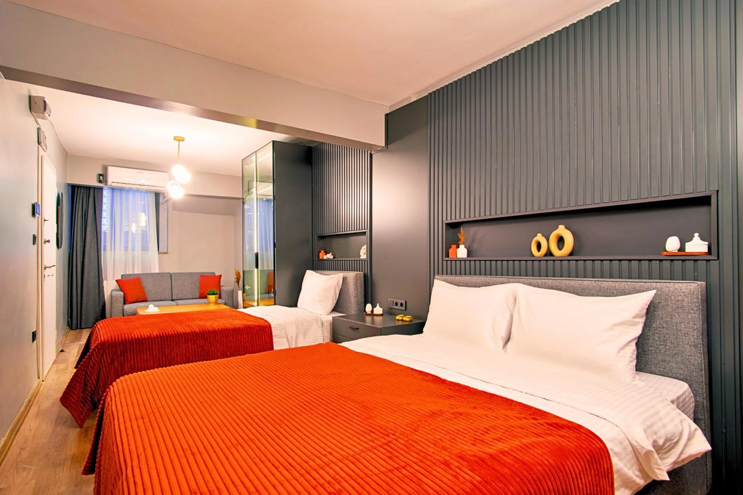 Bed in TAKS-INN Hotel