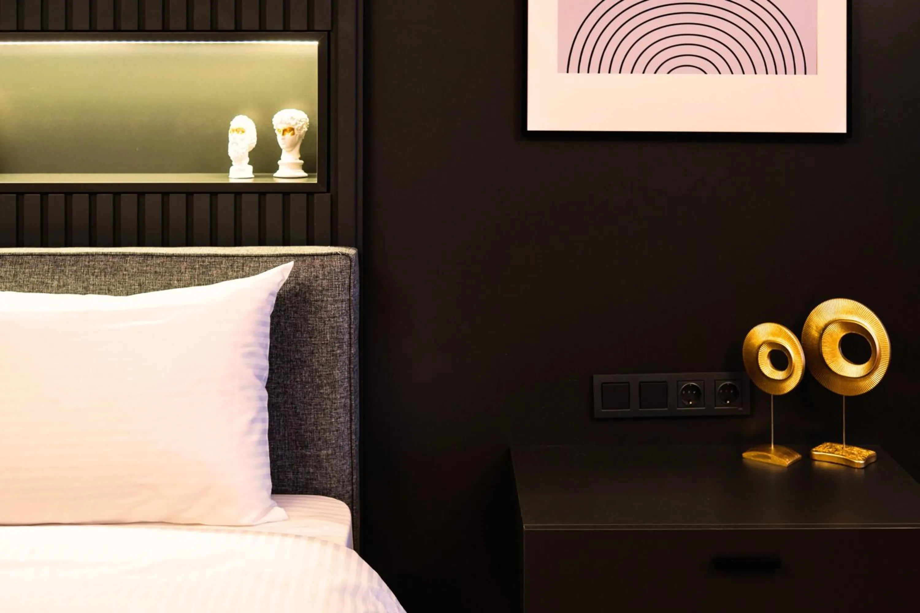 Bed in TAKS-INN Hotel