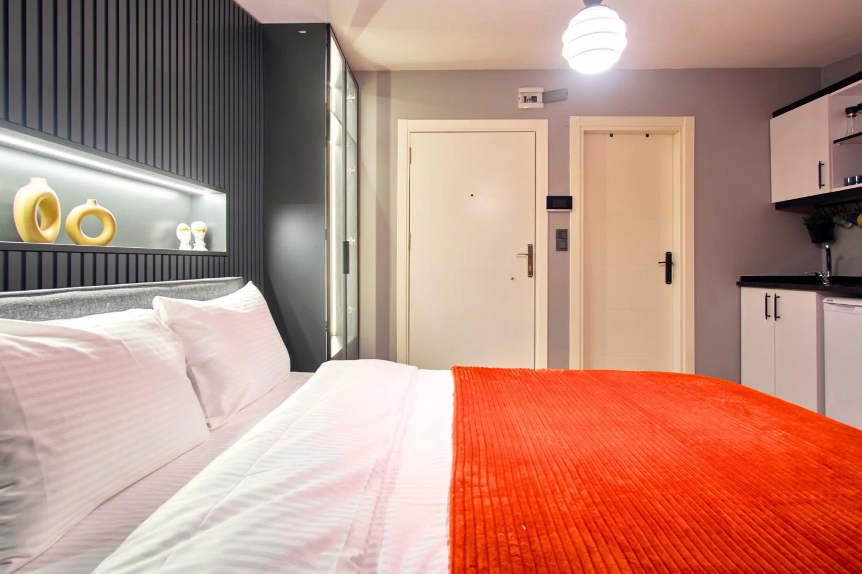 Bed in TAKS-INN Hotel