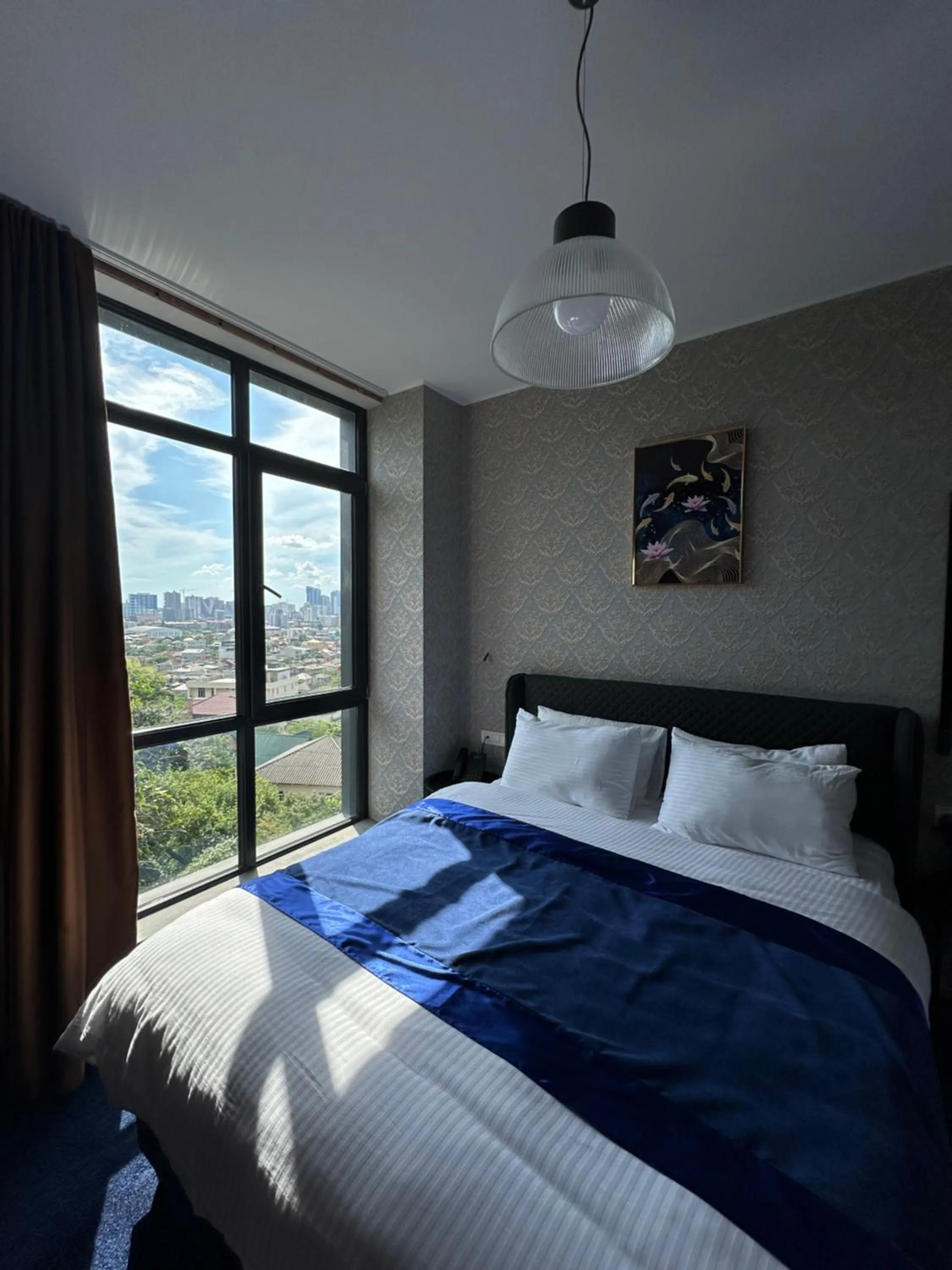 Bed in 10inn Boutique Hotel