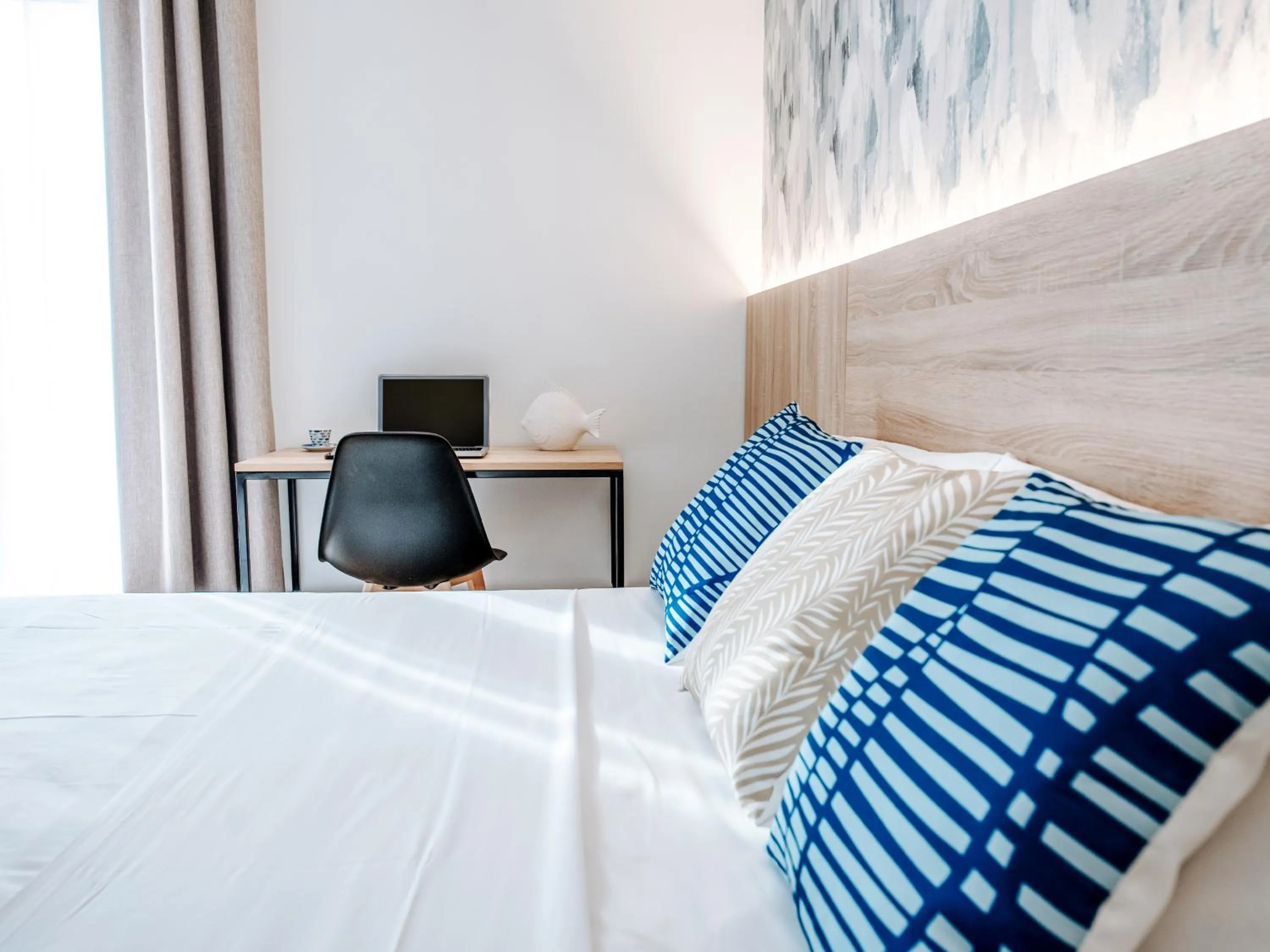 Bed in Sweet Lloret Suites