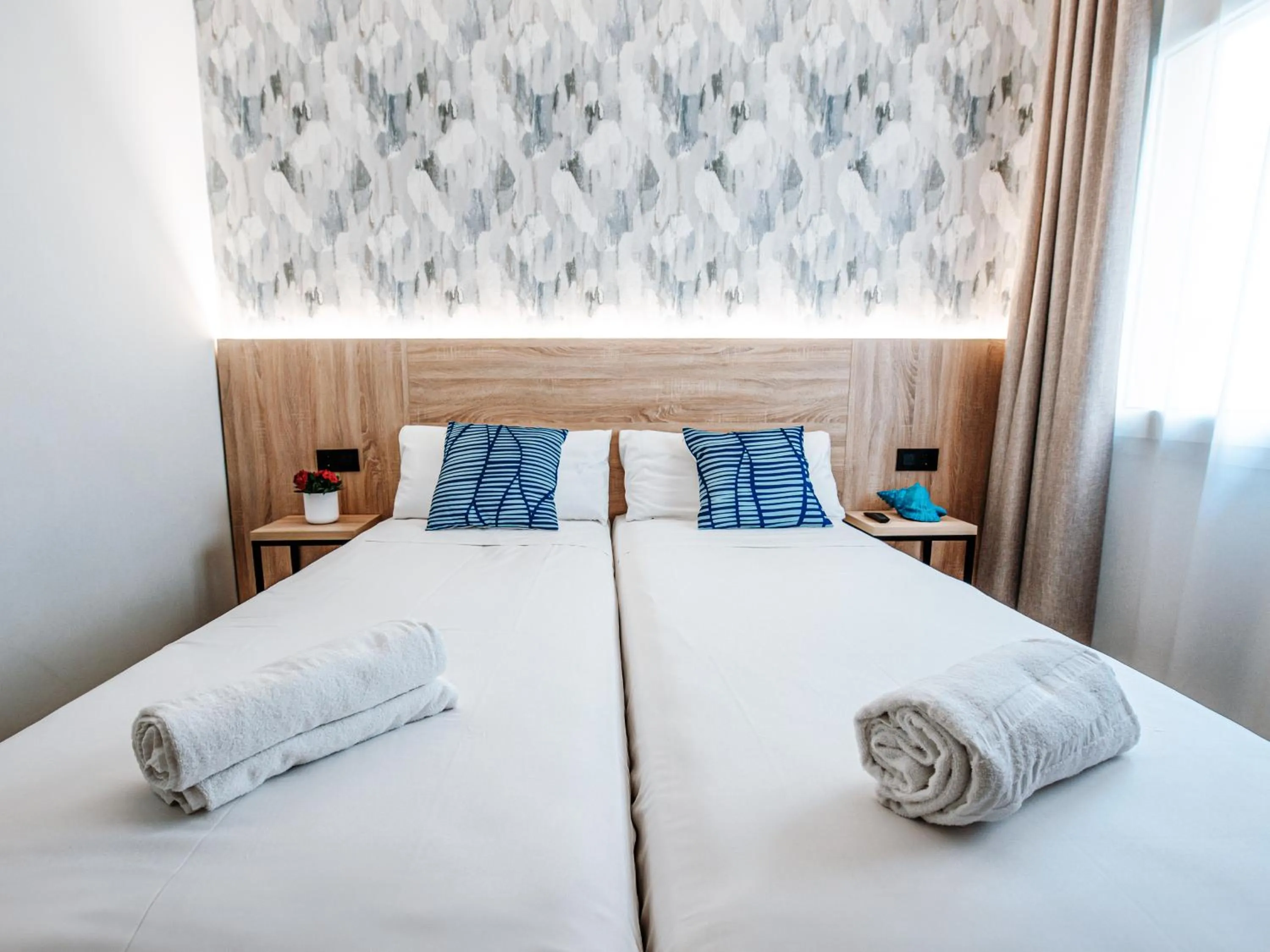 Bed in Sweet Lloret Suites