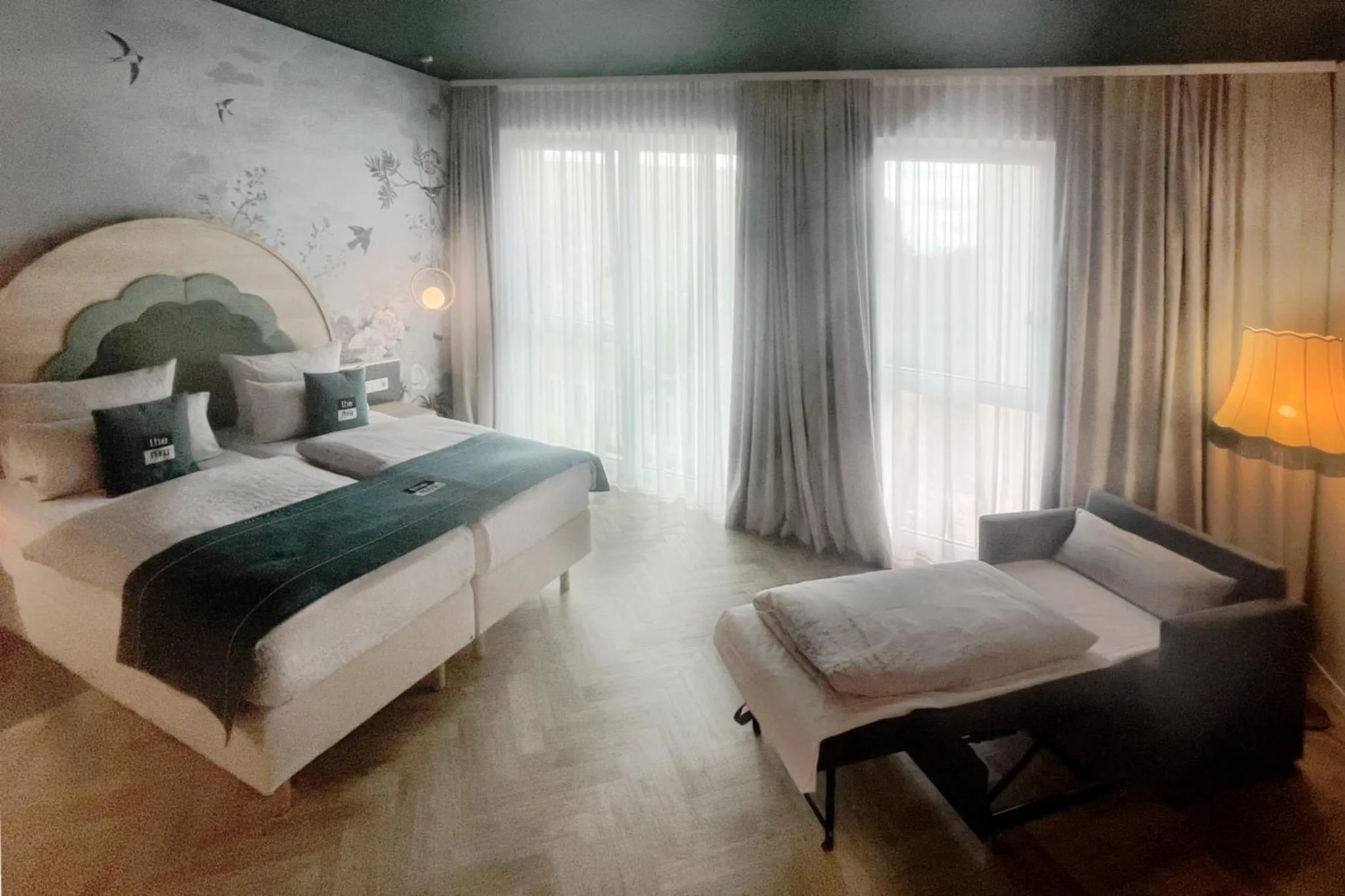 Photo of the whole room, Bed in Holiday Inn - the niu, Flower Konstanz by IHG