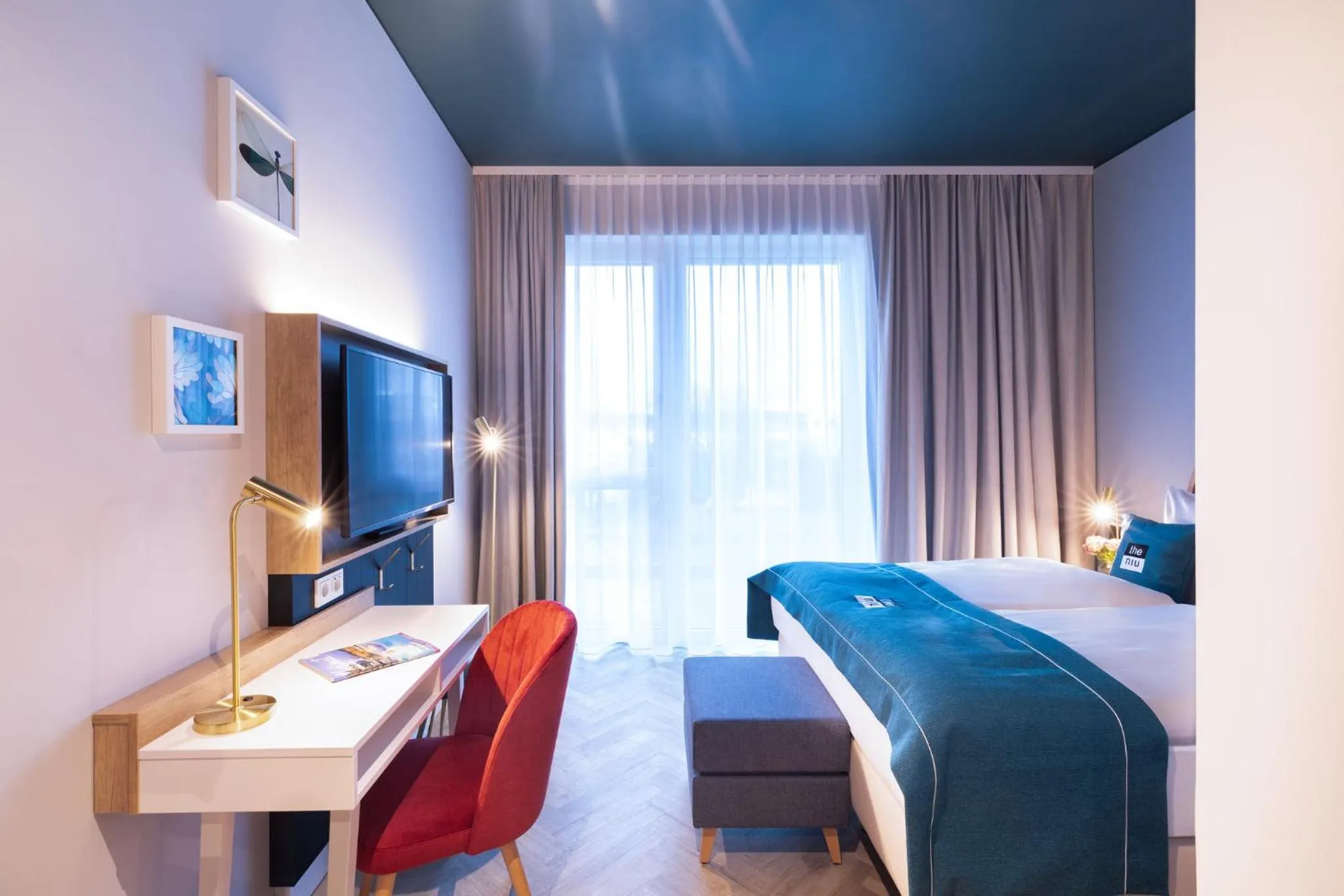 Photo of the whole room, Bed in Holiday Inn - the niu, Flower Konstanz by IHG