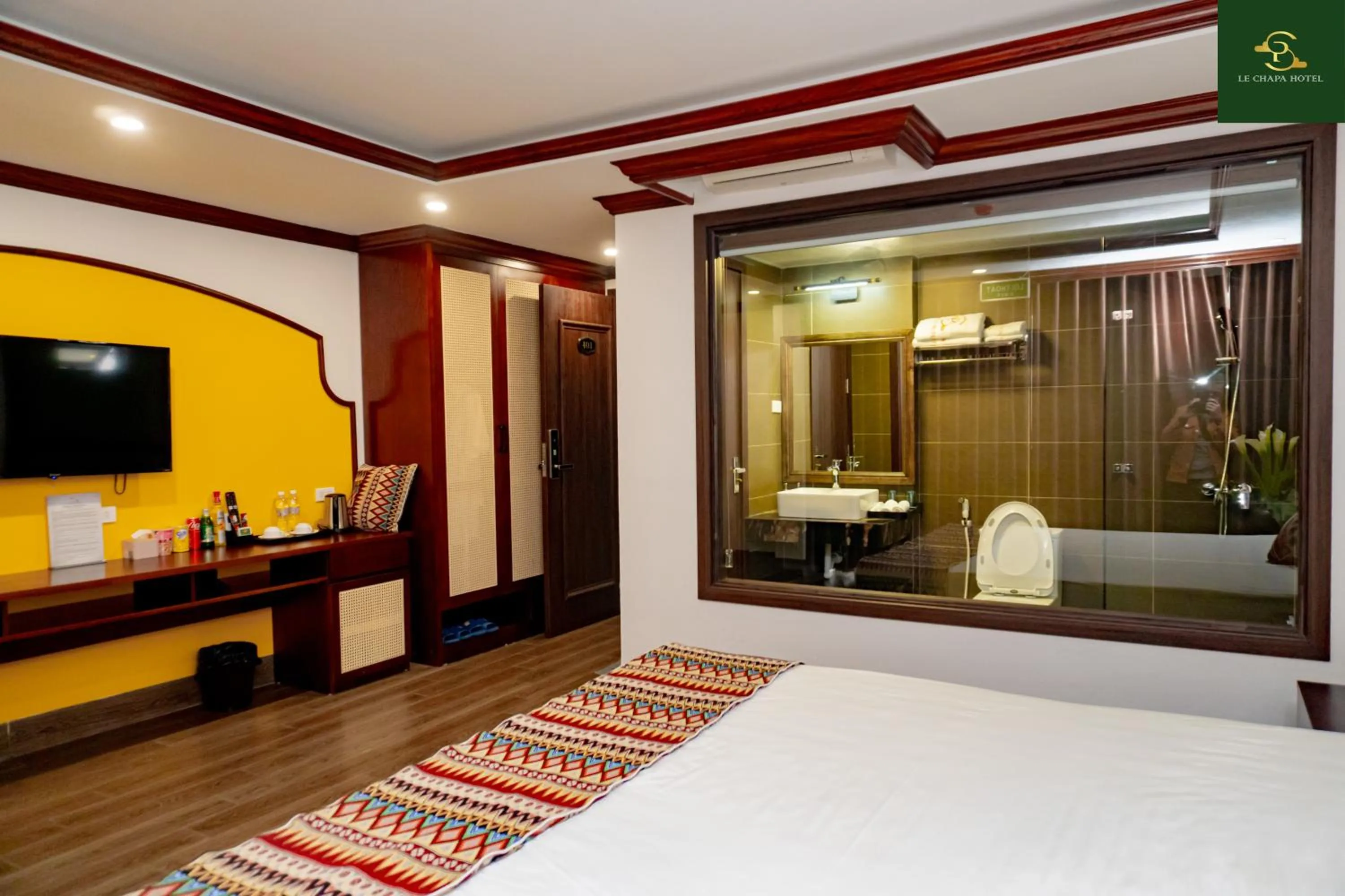 Communal lounge/ TV room, Bed in Le Chapa Hotel & Spa