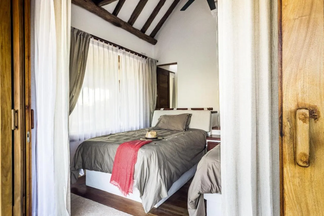 Bed in DK Luxury Ocean Front Villa - Adults Only