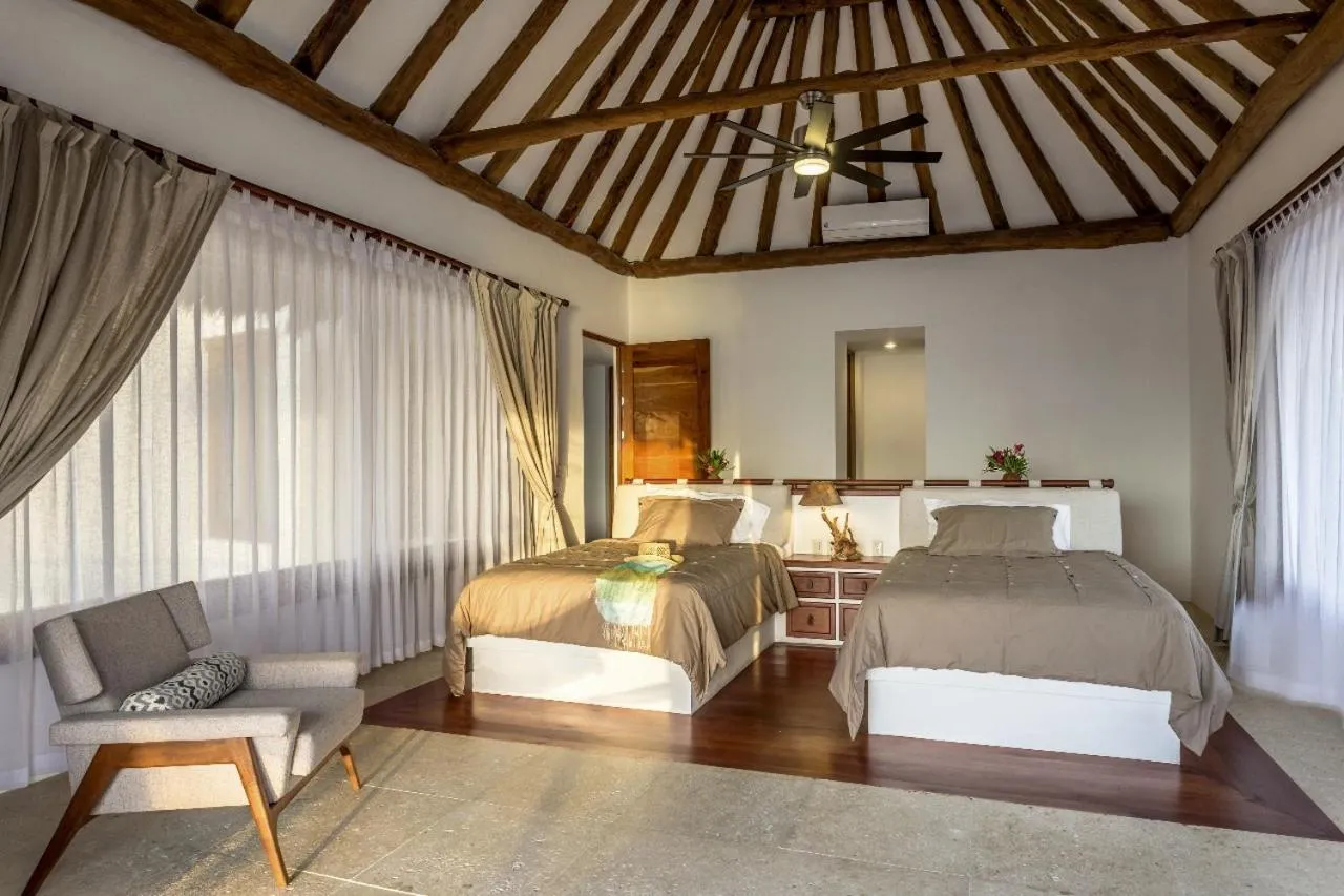 Bed in DK Luxury Ocean Front Villa - Adults Only