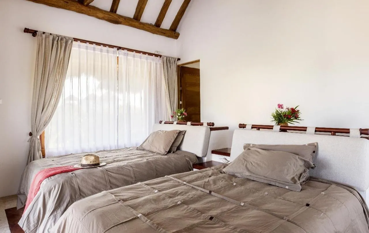 Bed in DK Luxury Ocean Front Villa - Adults Only