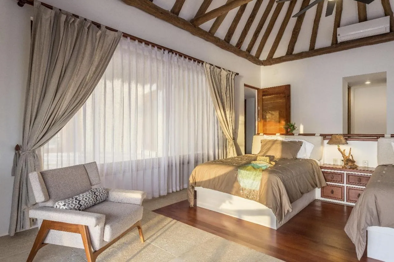 Bed in DK Luxury Ocean Front Villa - Adults Only