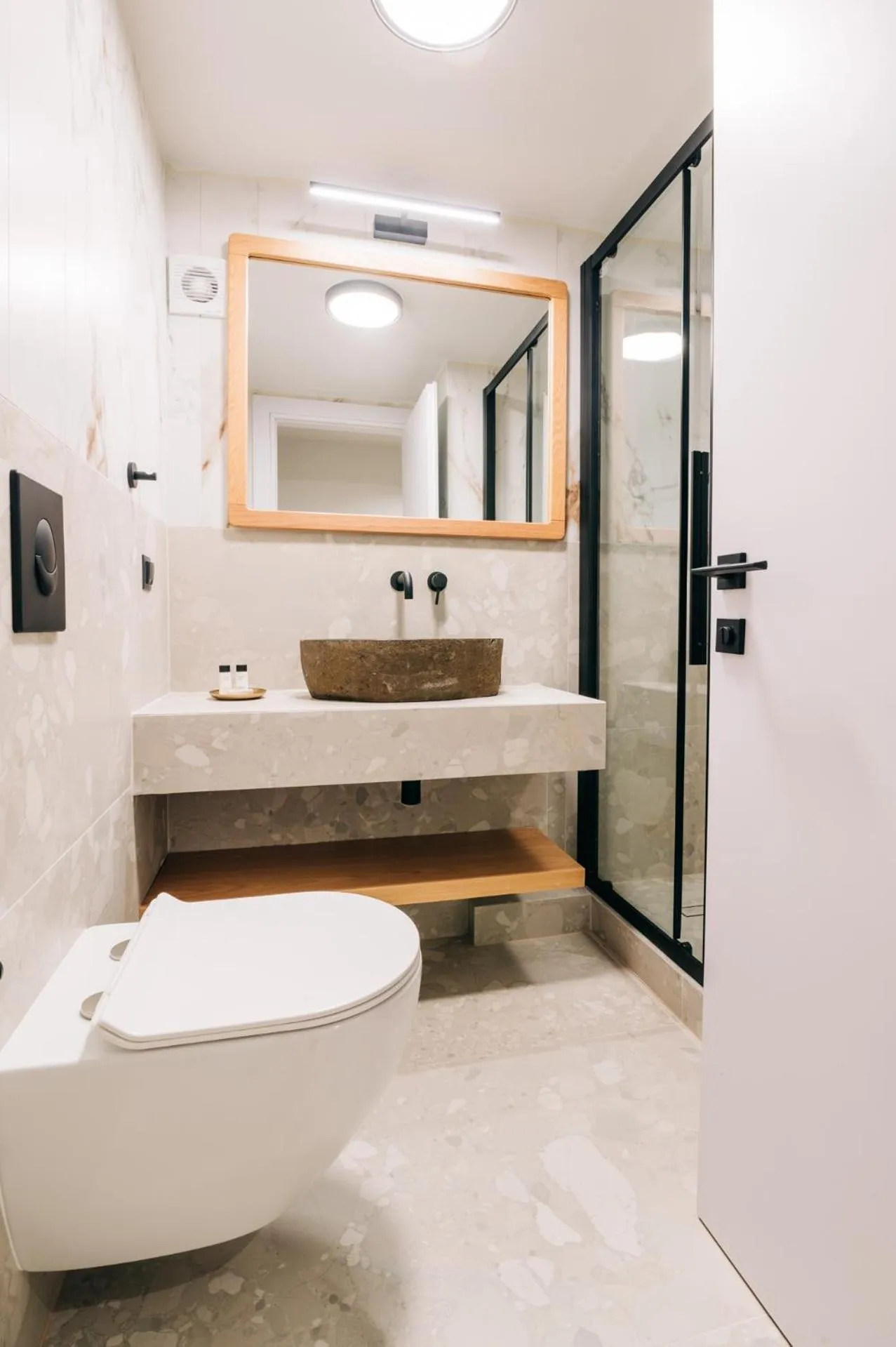 Shower in Athesense Suites