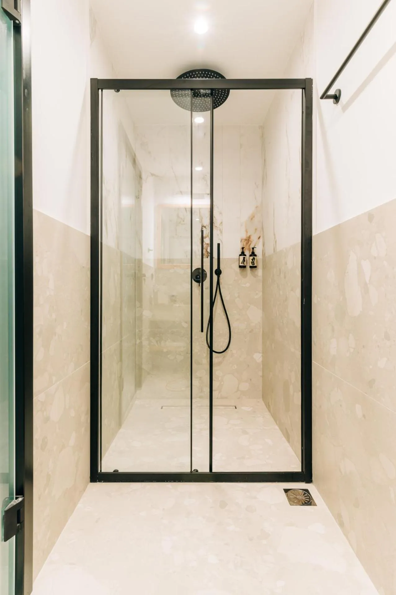 Shower in Athesense Suites