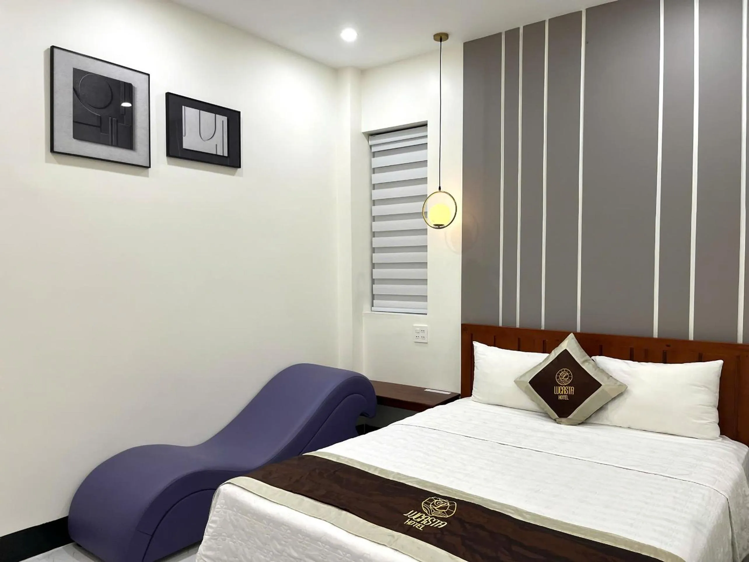 Bed in Lucasta Hotel