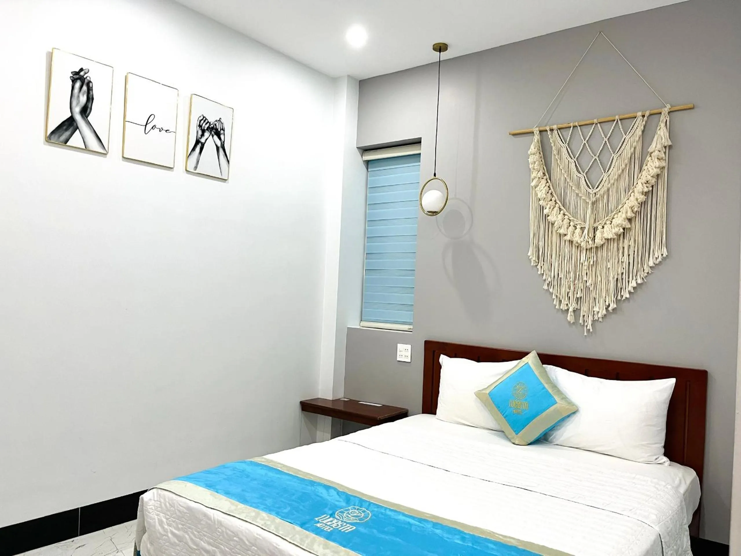 Bed in Lucasta Hotel