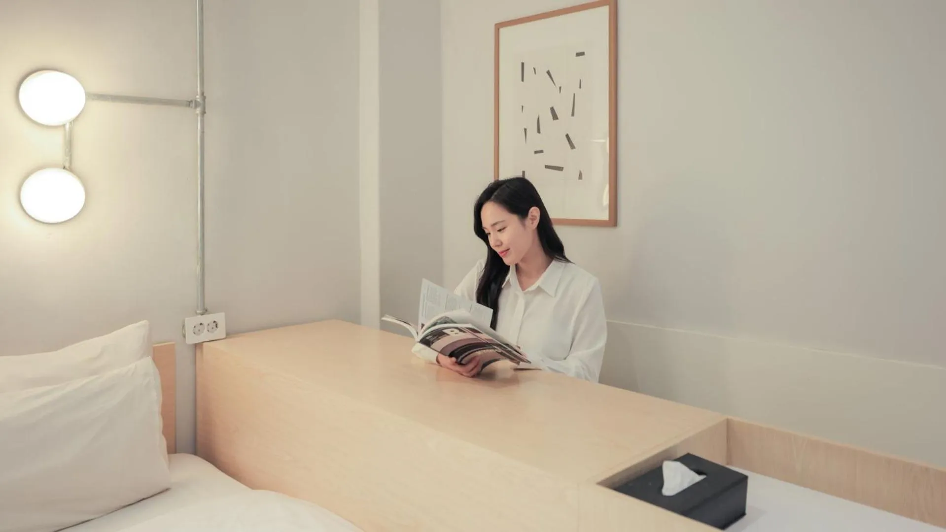 Seating area, Bed in Aank Hotel Osan