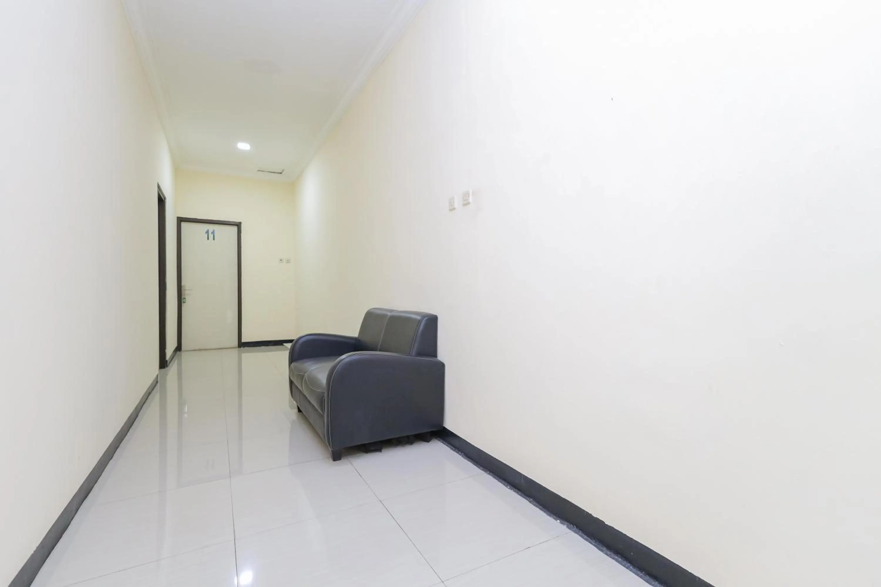 Living room in Urbanview Roemah Tebet by RedDoorz