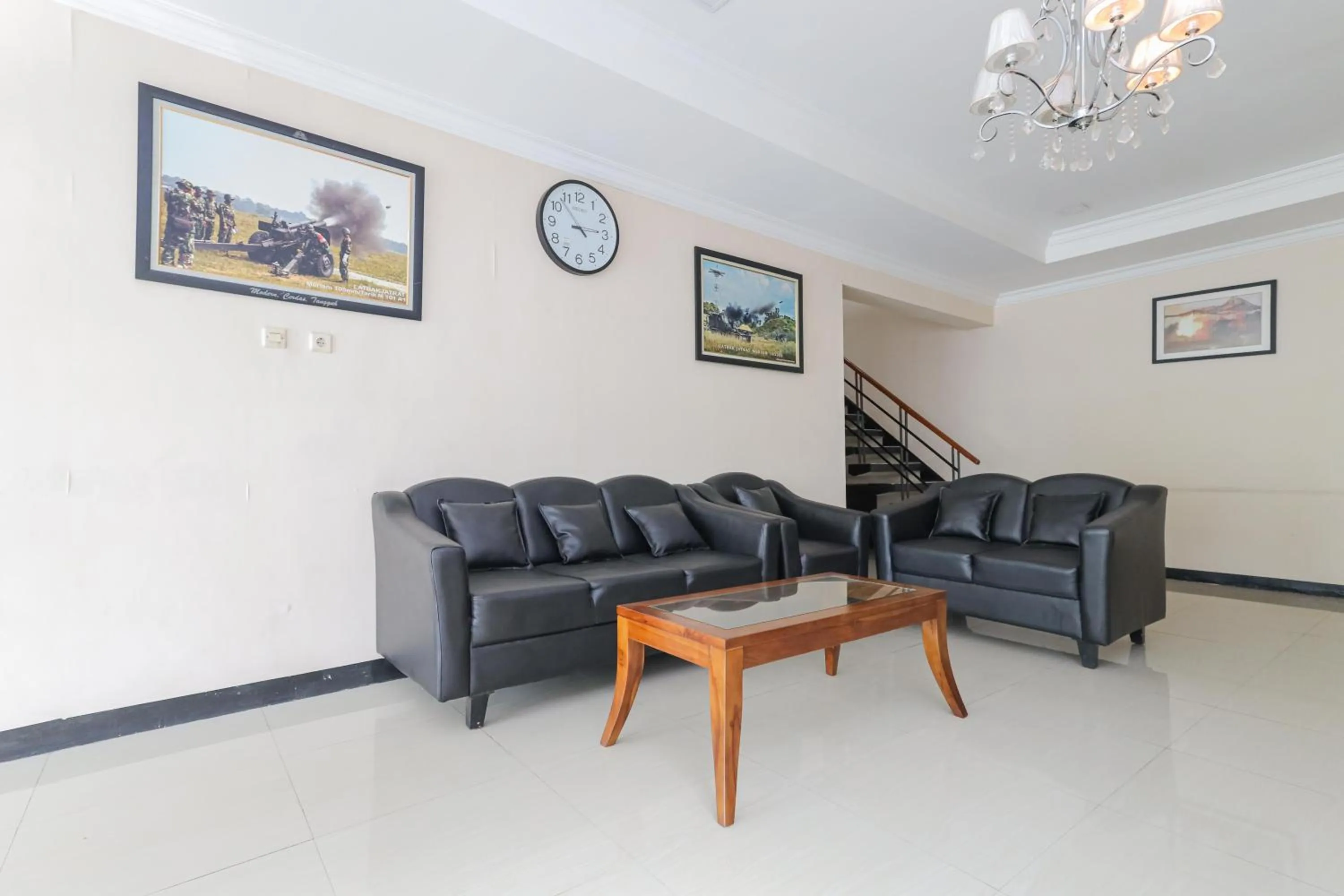 Living room in Urbanview Roemah Tebet by RedDoorz