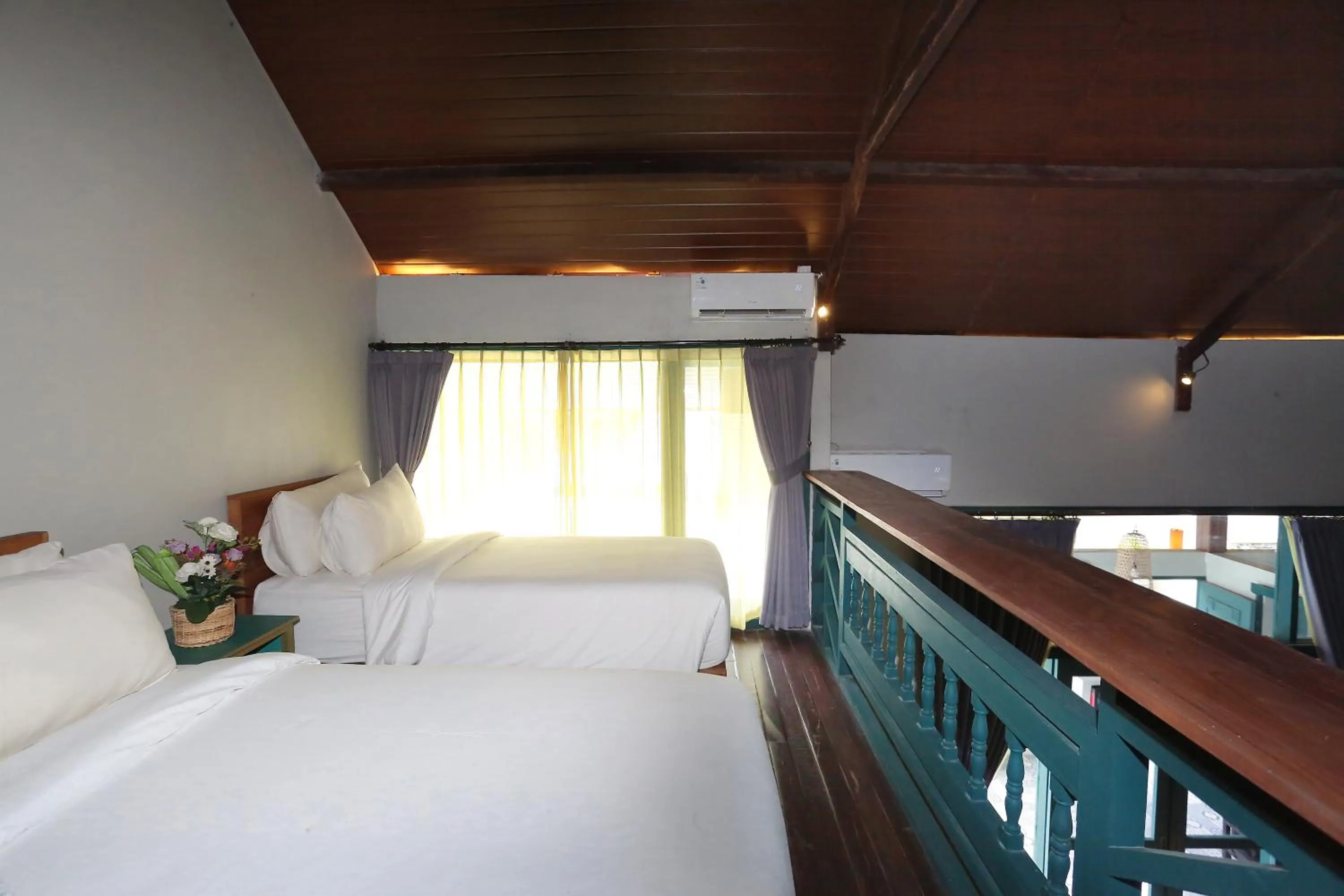 Bed in The Reward Villas