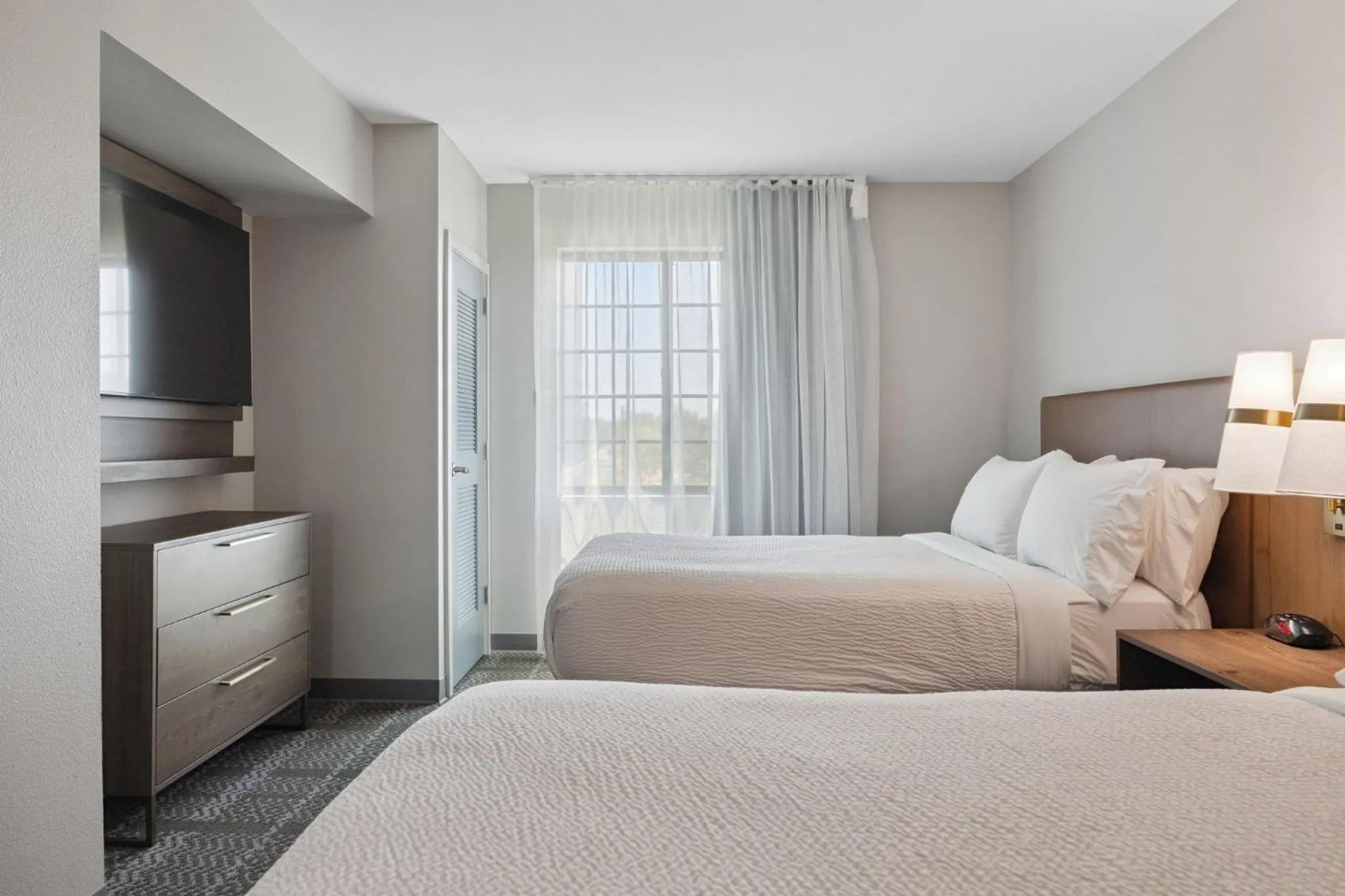 Photo of the whole room, Bed in Staybridge Suites Sacramento Woodland by IHG