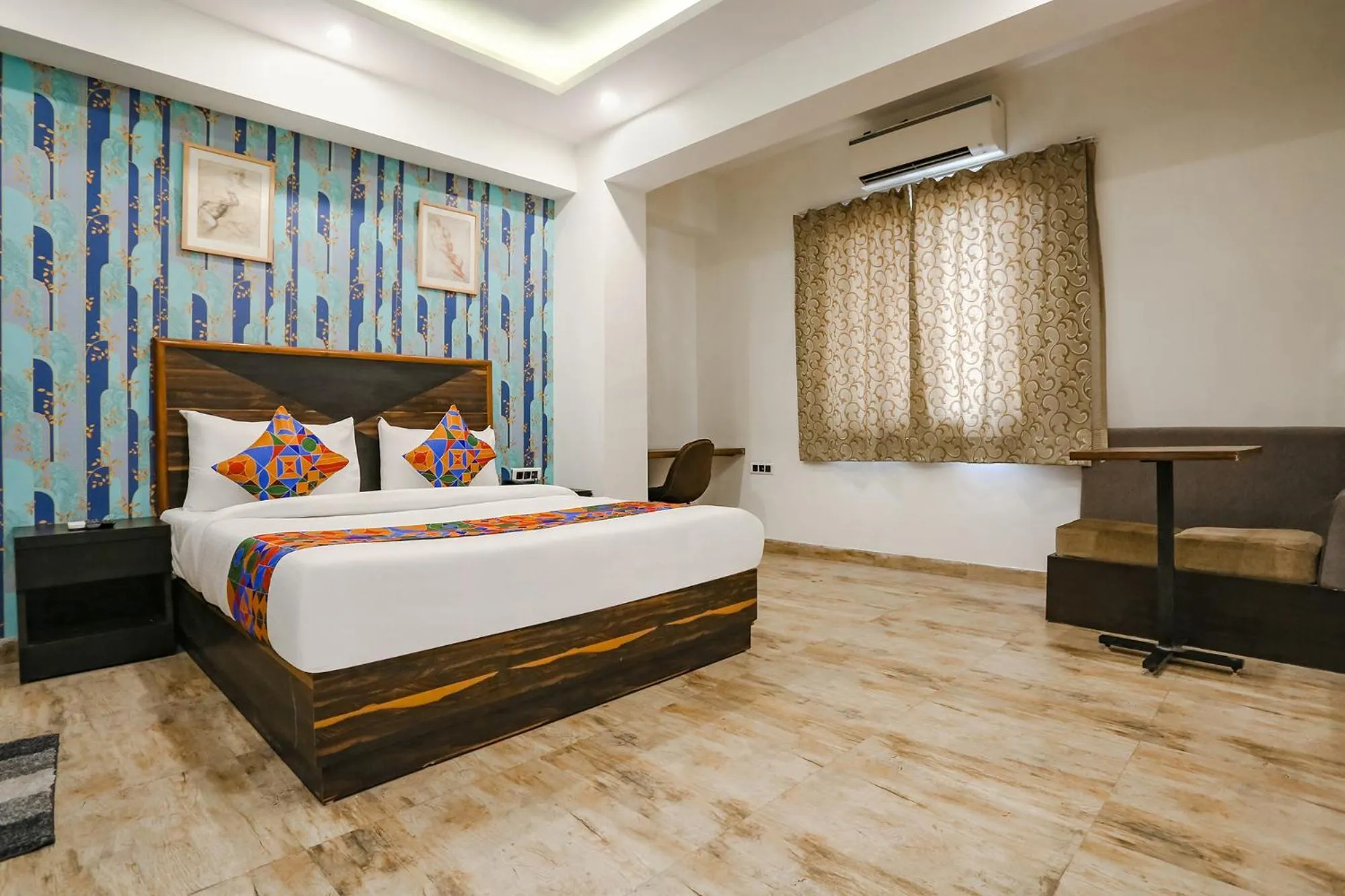 Bed in FabHotel Delta Suites I