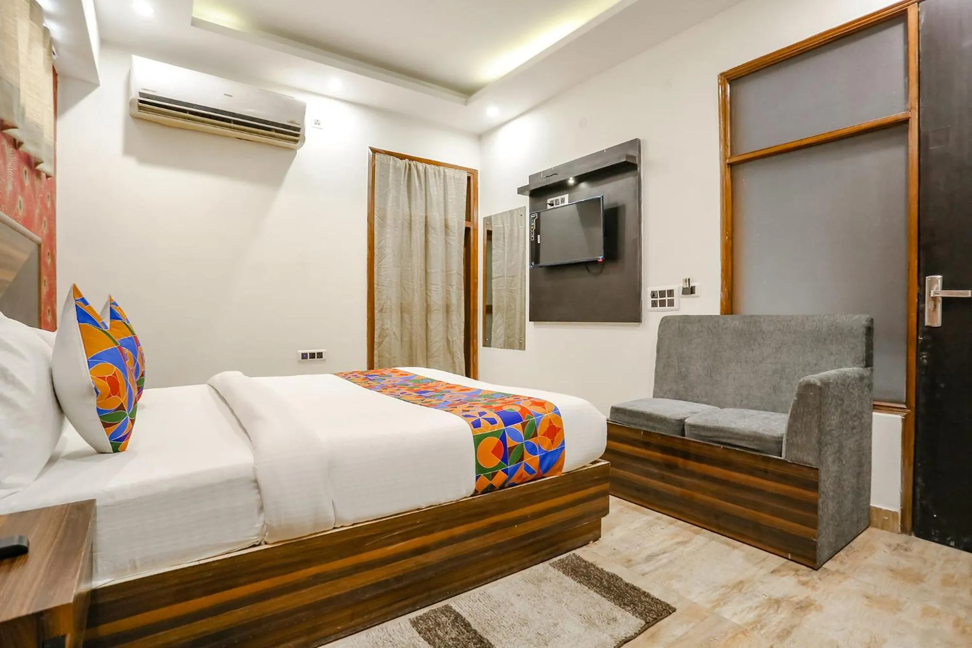 Communal lounge/ TV room, Bed in FabHotel Delta Suites I