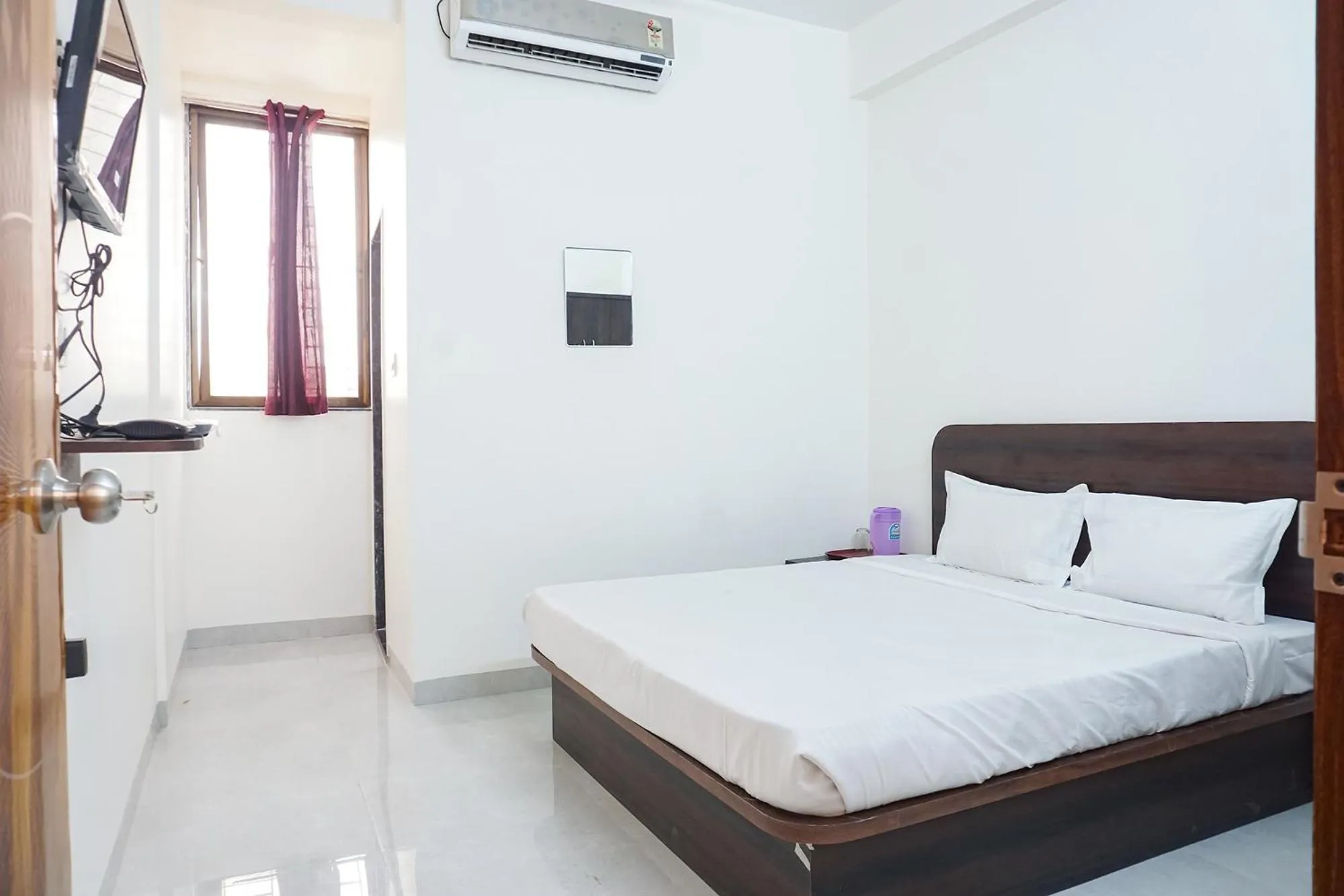 Communal lounge/ TV room, Bed in FabHotel Gargi Galuxe - Nr Ankushrao Natyagruha