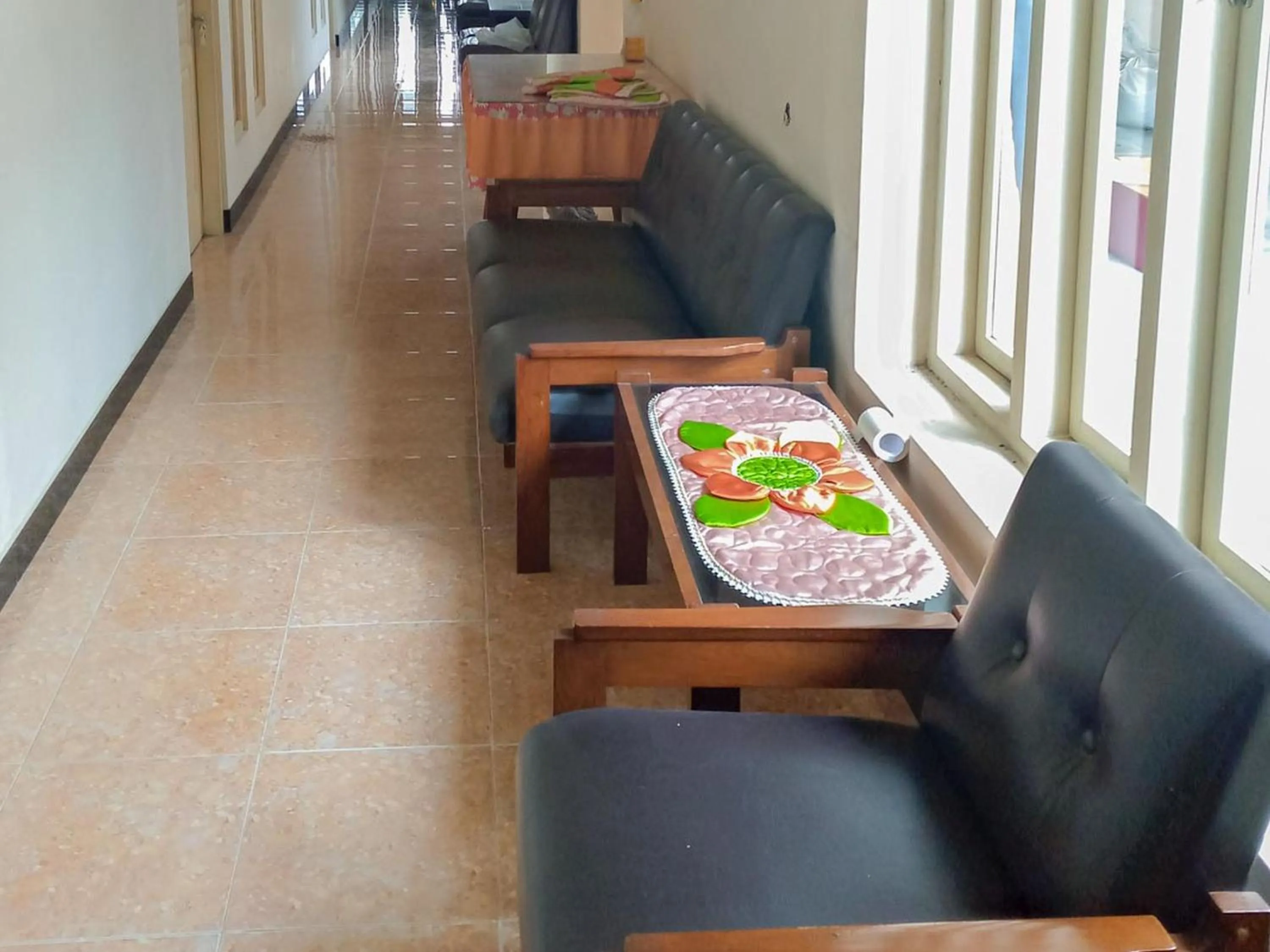 Living room in RedDoorz Syariah near Pasar Sleko Madiun