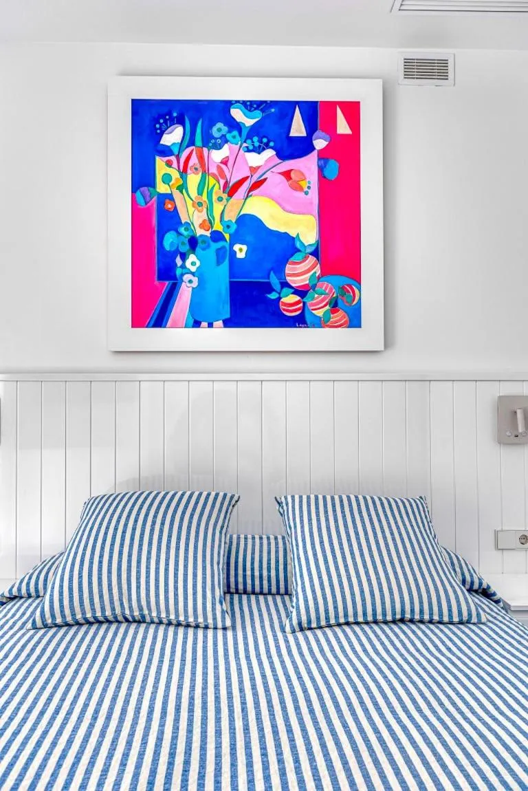 Bed in The Pink Elephant Hotel