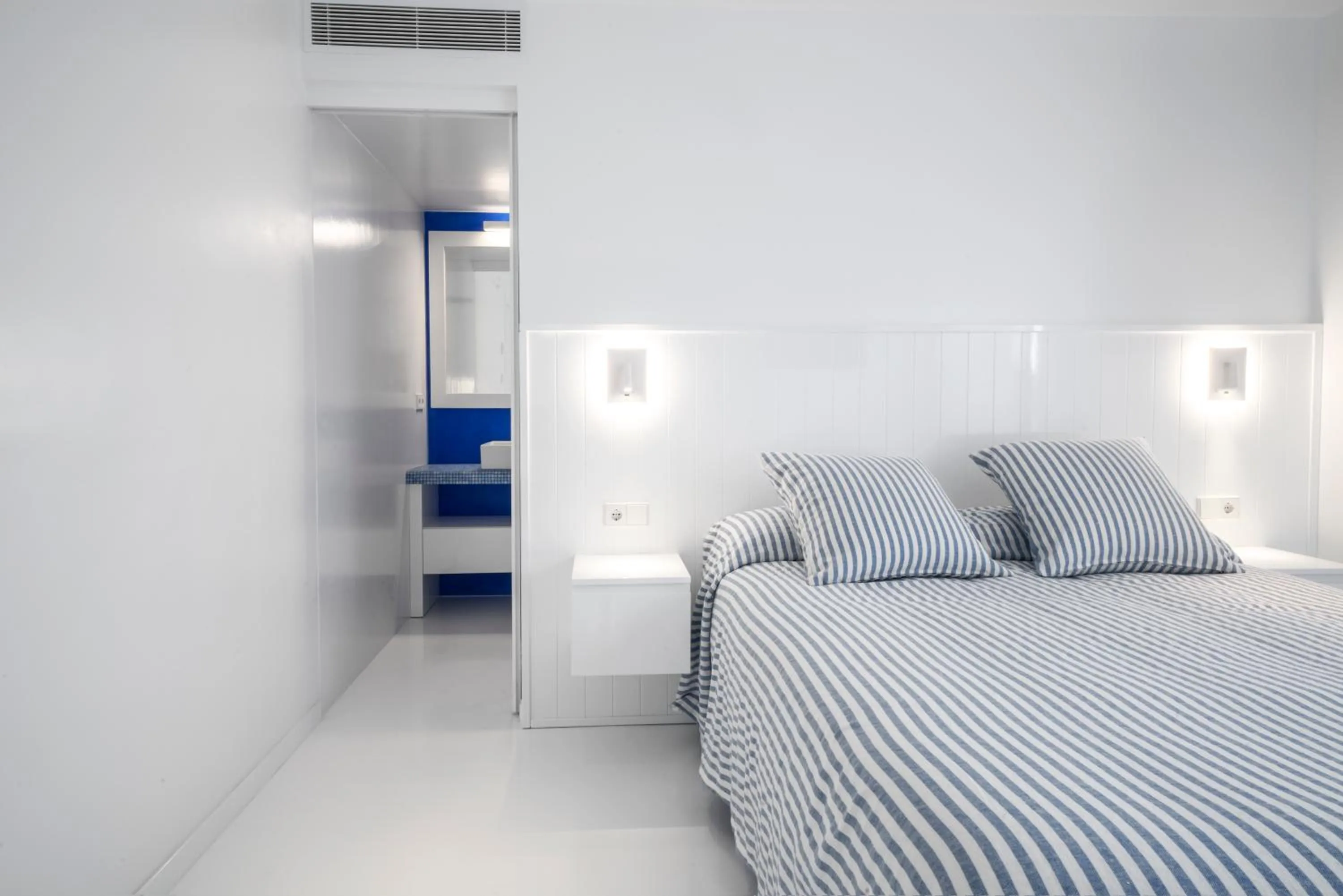 Bed in The Pink Elephant Hotel