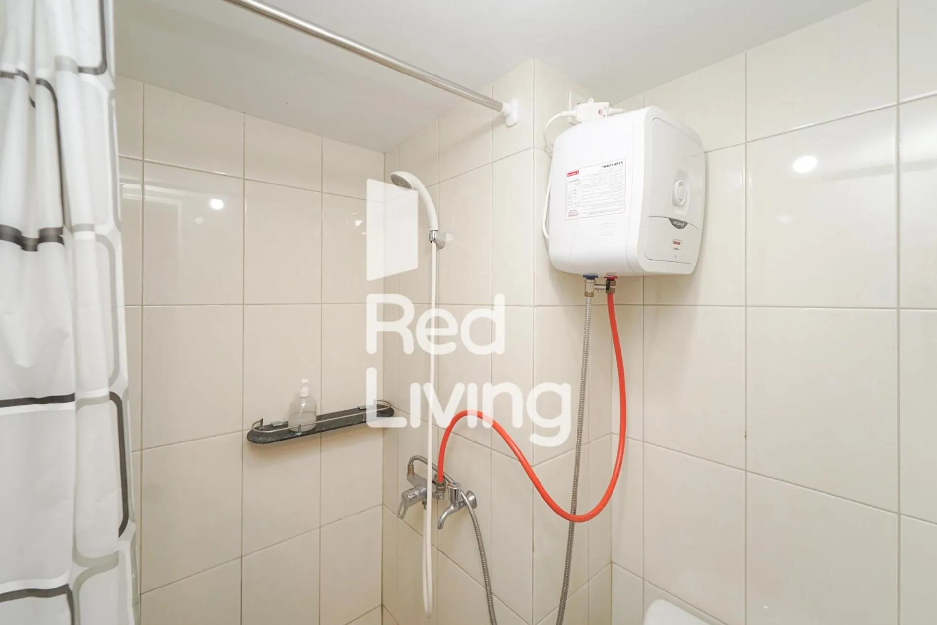 Bathroom in Redliving Apartemen Springlake Summarecon - MDH Rooms Tower Caldesia with Netflix