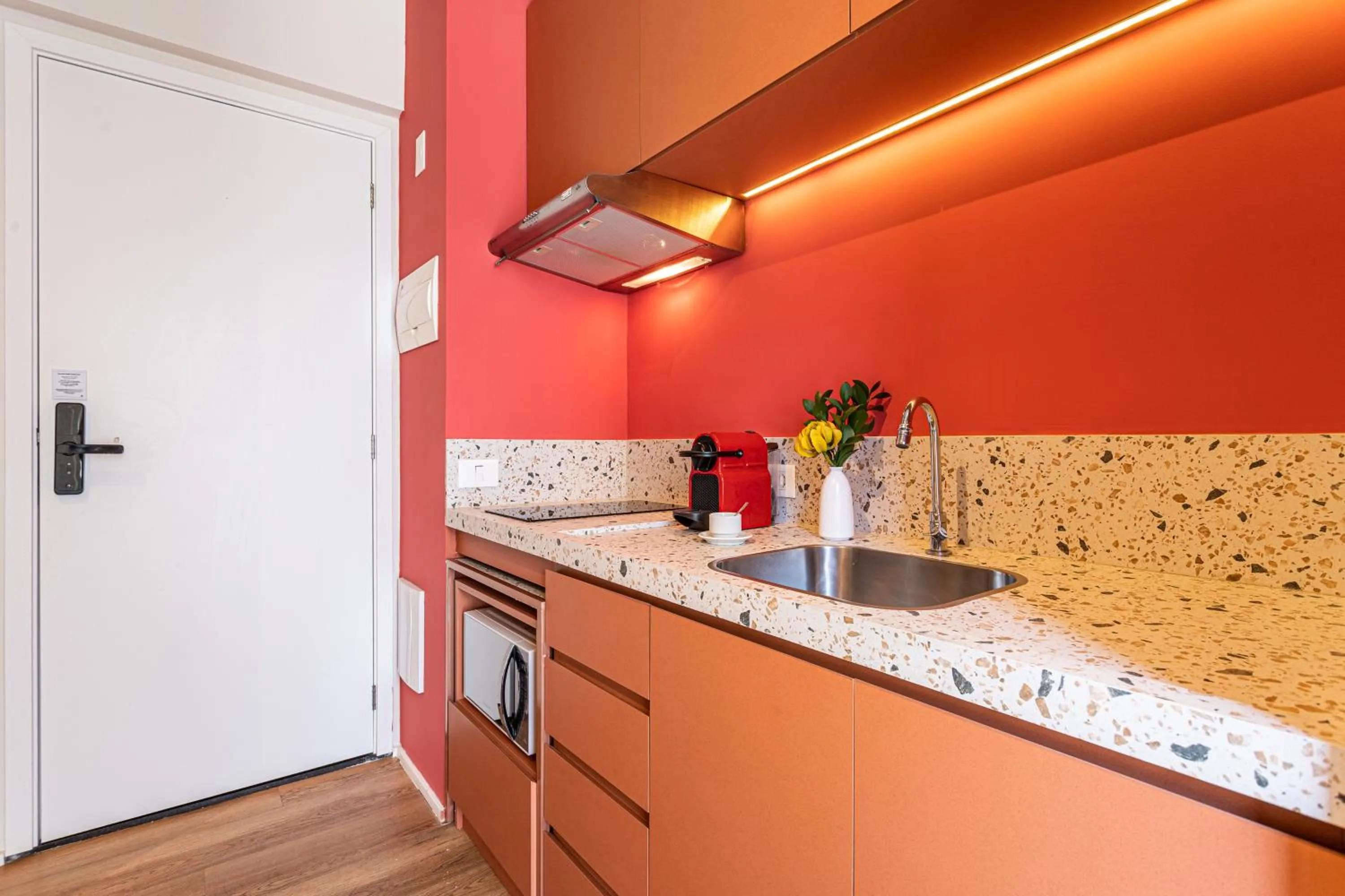 Kitchen or kitchenette in Next Paulista by Viva - Apartamentos completos ao lado da Av Paulista e MASP