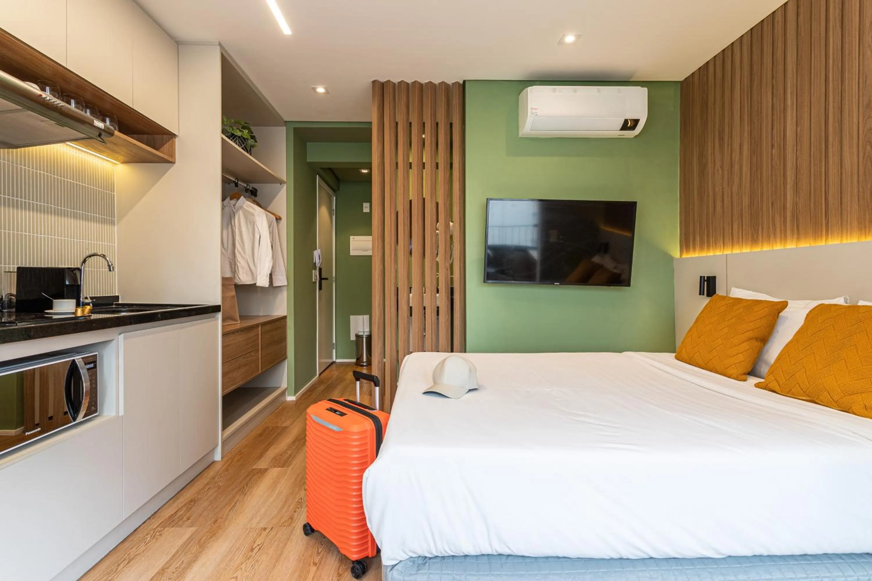 Kitchen or kitchenette, Bed in Next Paulista by Viva - Apartamentos completos ao lado da Av Paulista e MASP