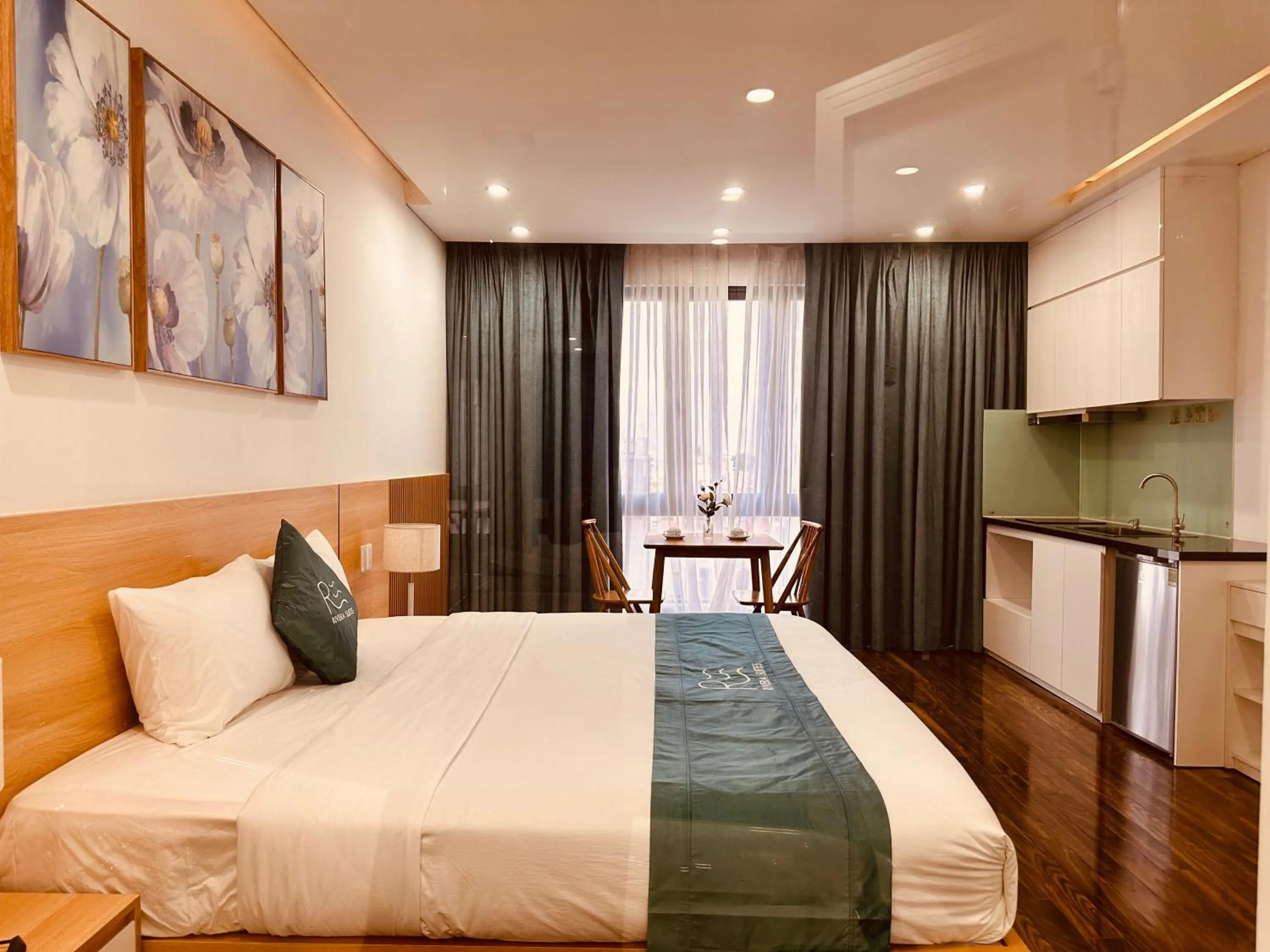 Bed in Rivera Suites