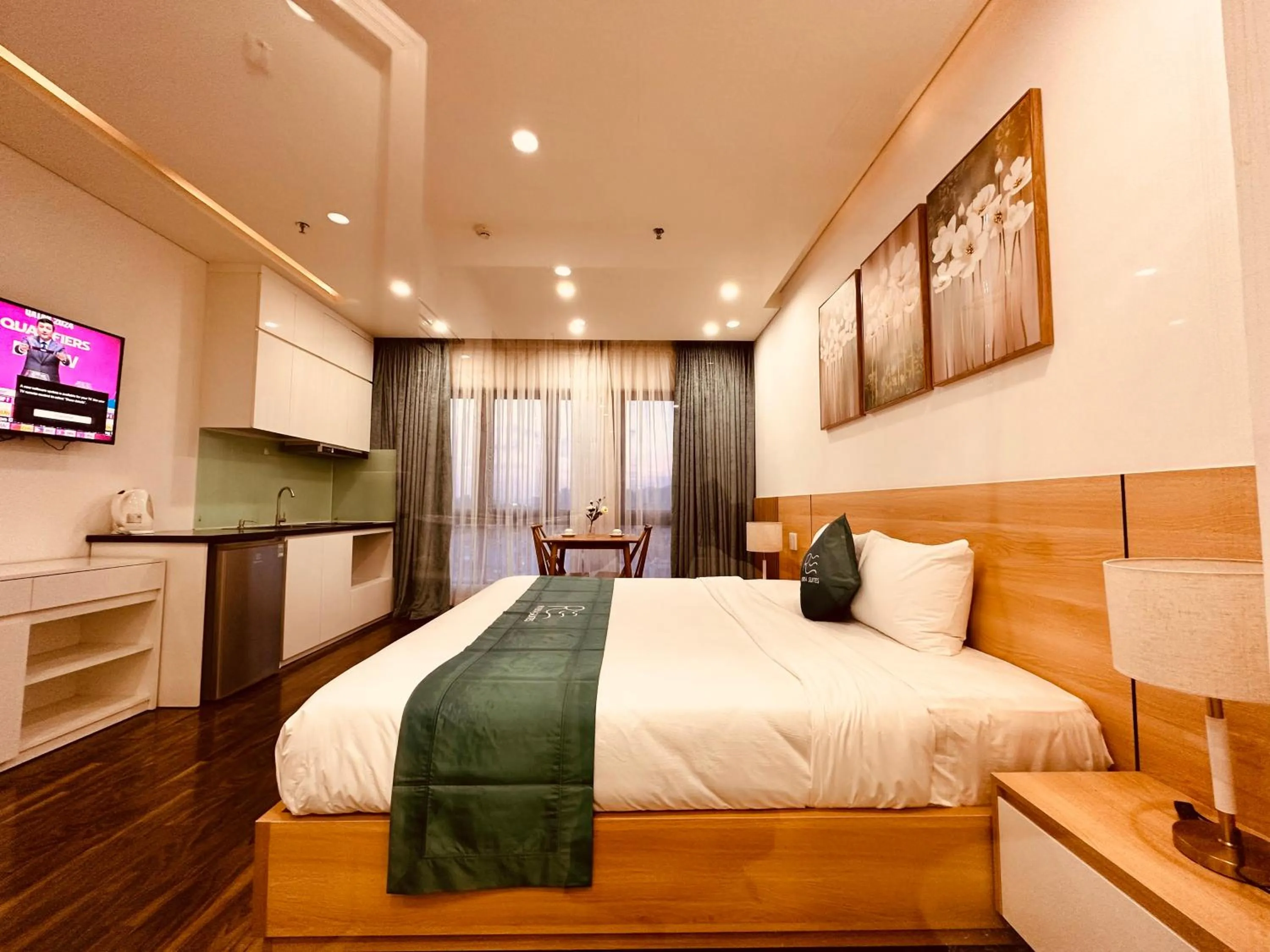 Bed in Rivera Suites