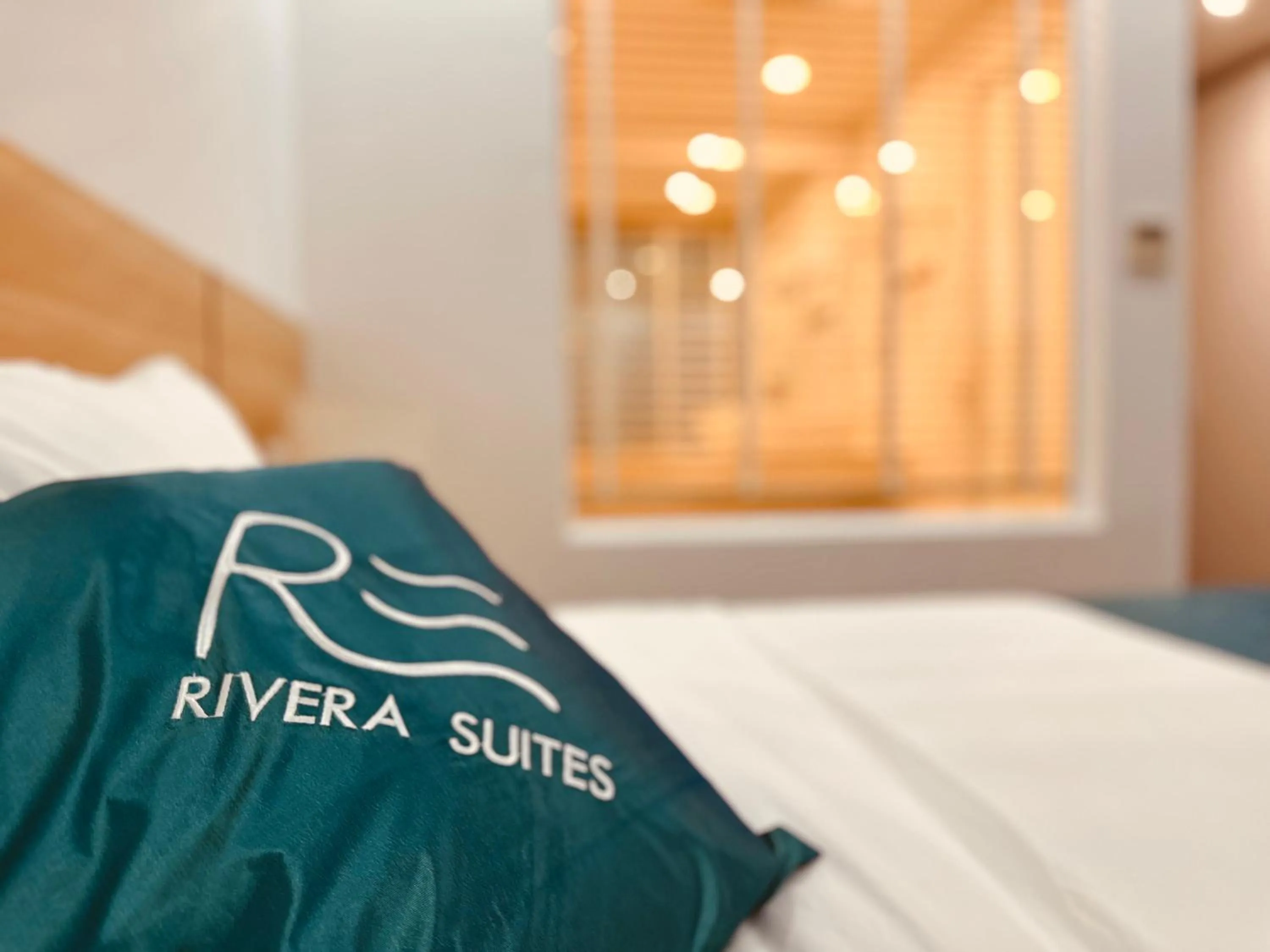 Bed in Rivera Suites