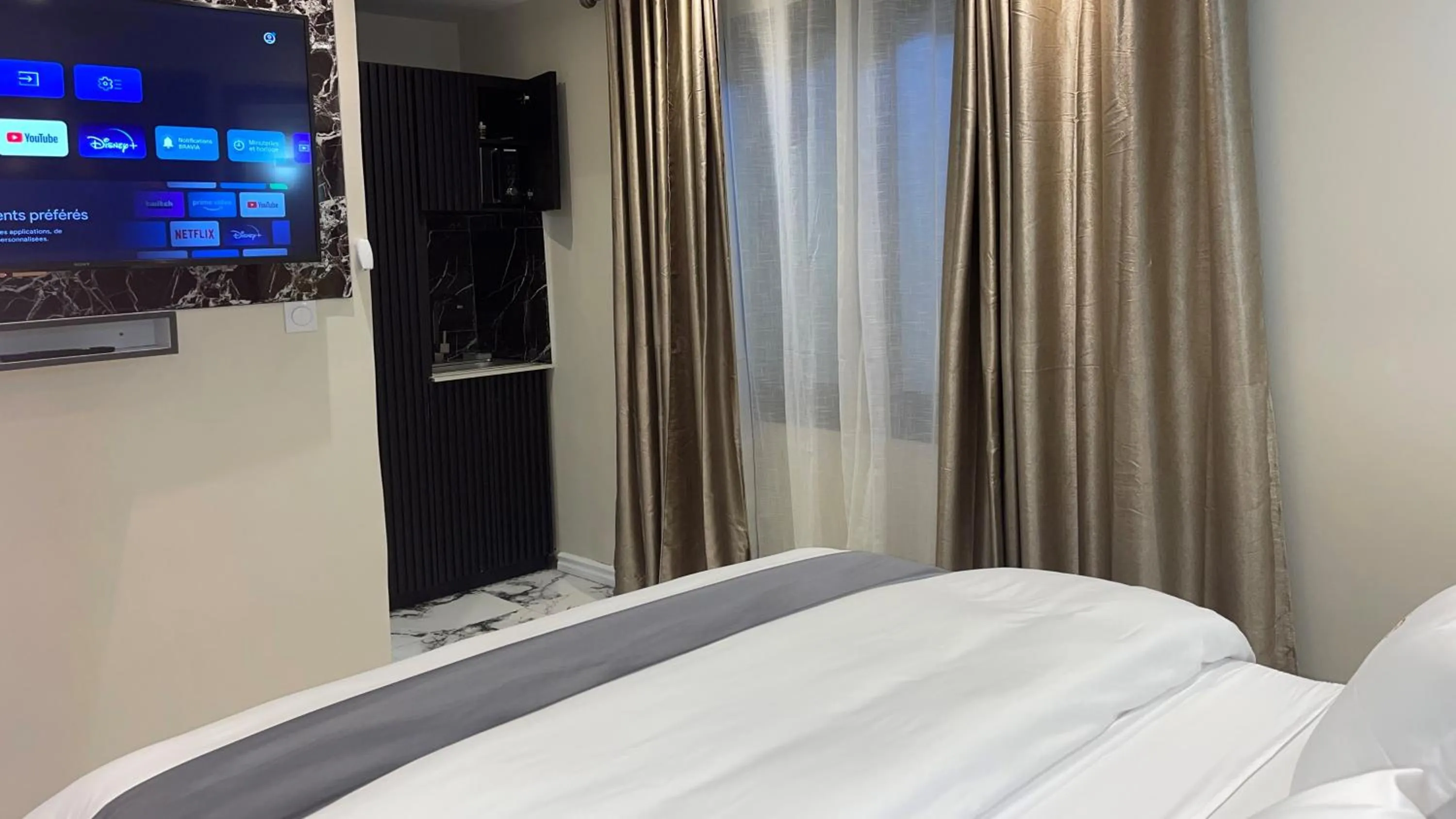 TV and multimedia, Bed in Suna' a Home Bonapriso